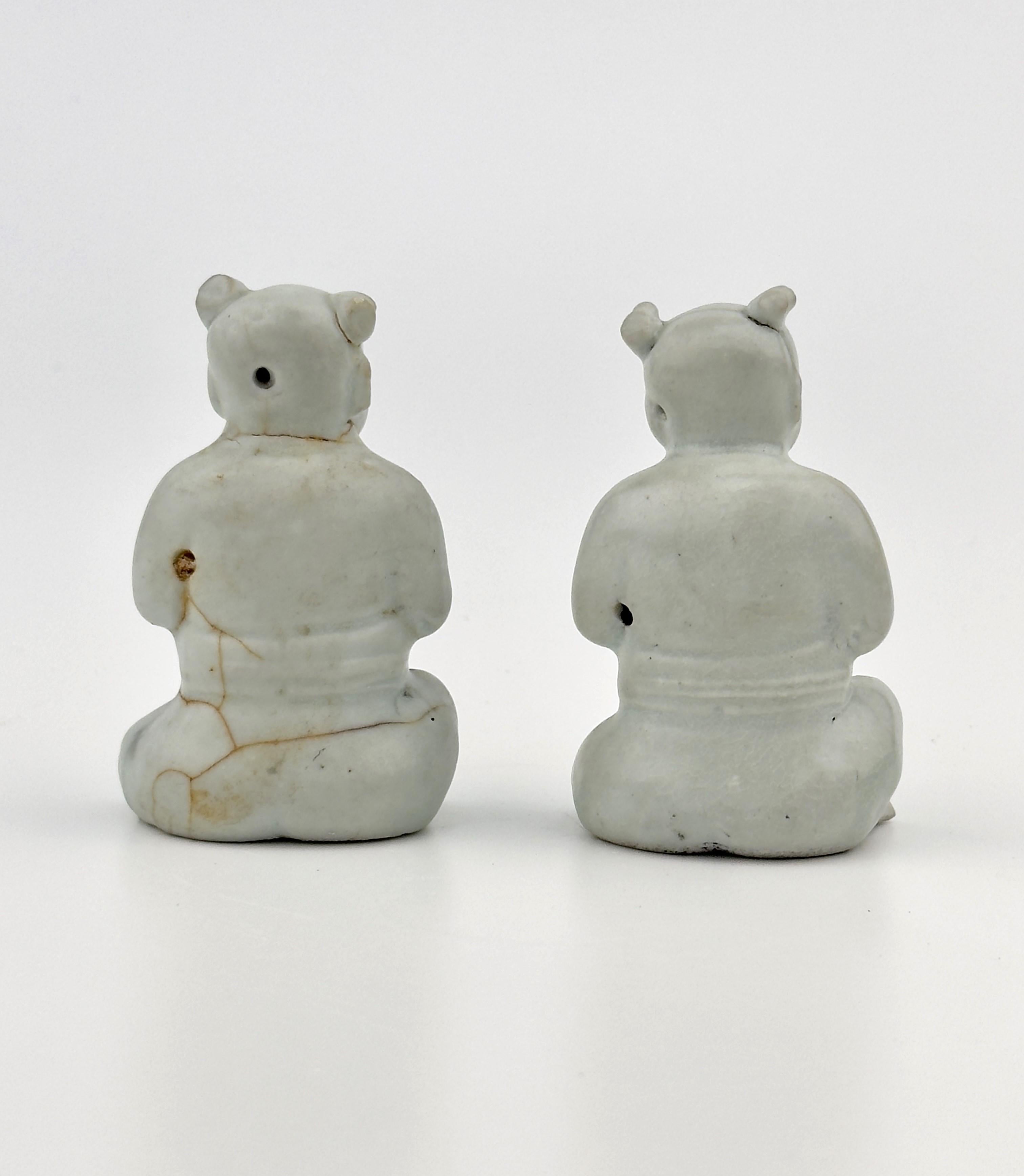 Glazed Two Figurine of Seated Boys, Circa 1725, Qing Dynasty, Yongzheng Reign For Sale