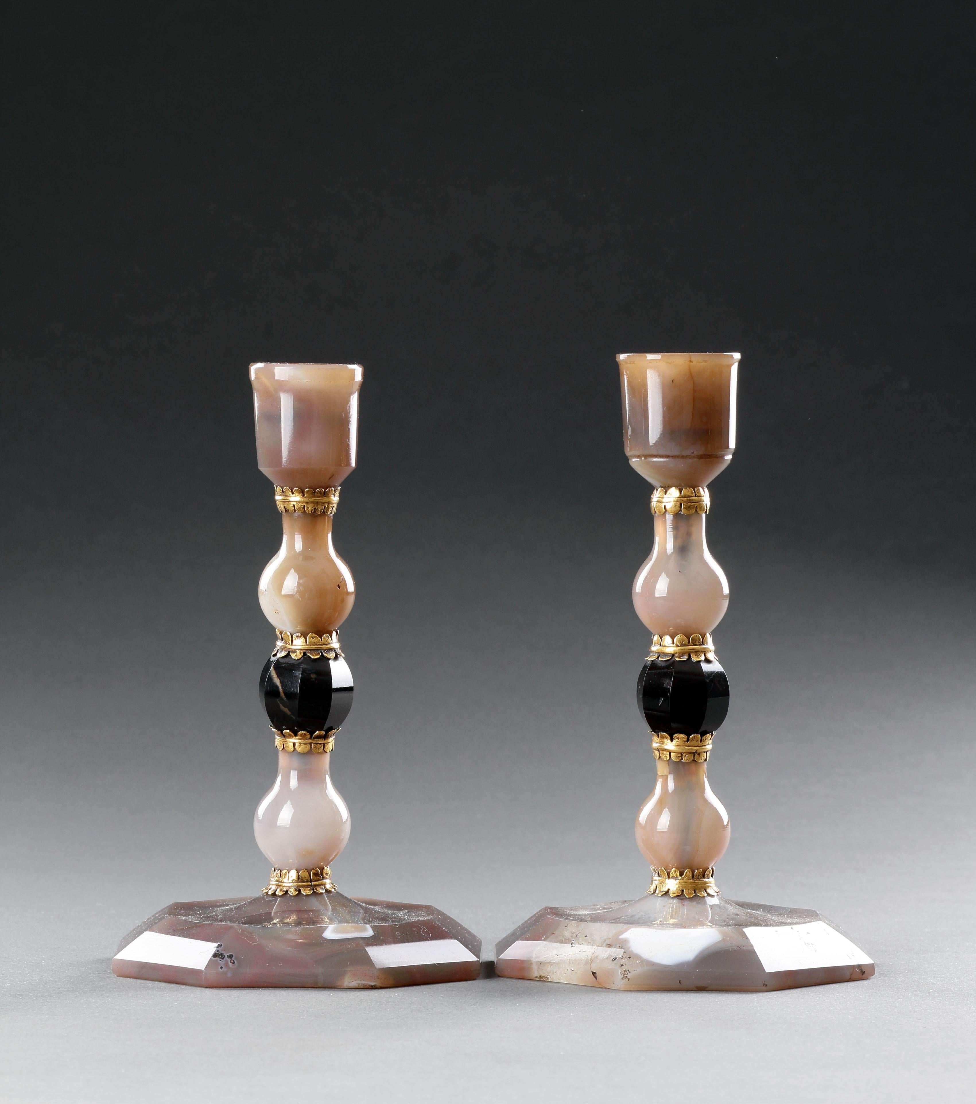 Two Fine ‘Kunstkammer’ Candlesticks
Agate, Glass, Fire-gilt Bronze mounts
Dresden, Germany

17th Century

Size: 16cm high - 6¼ ins high

Provenance:
Ex Kugel Galerie, Paris, France
Ex Peter Tillou collection 
Ex Private collection 