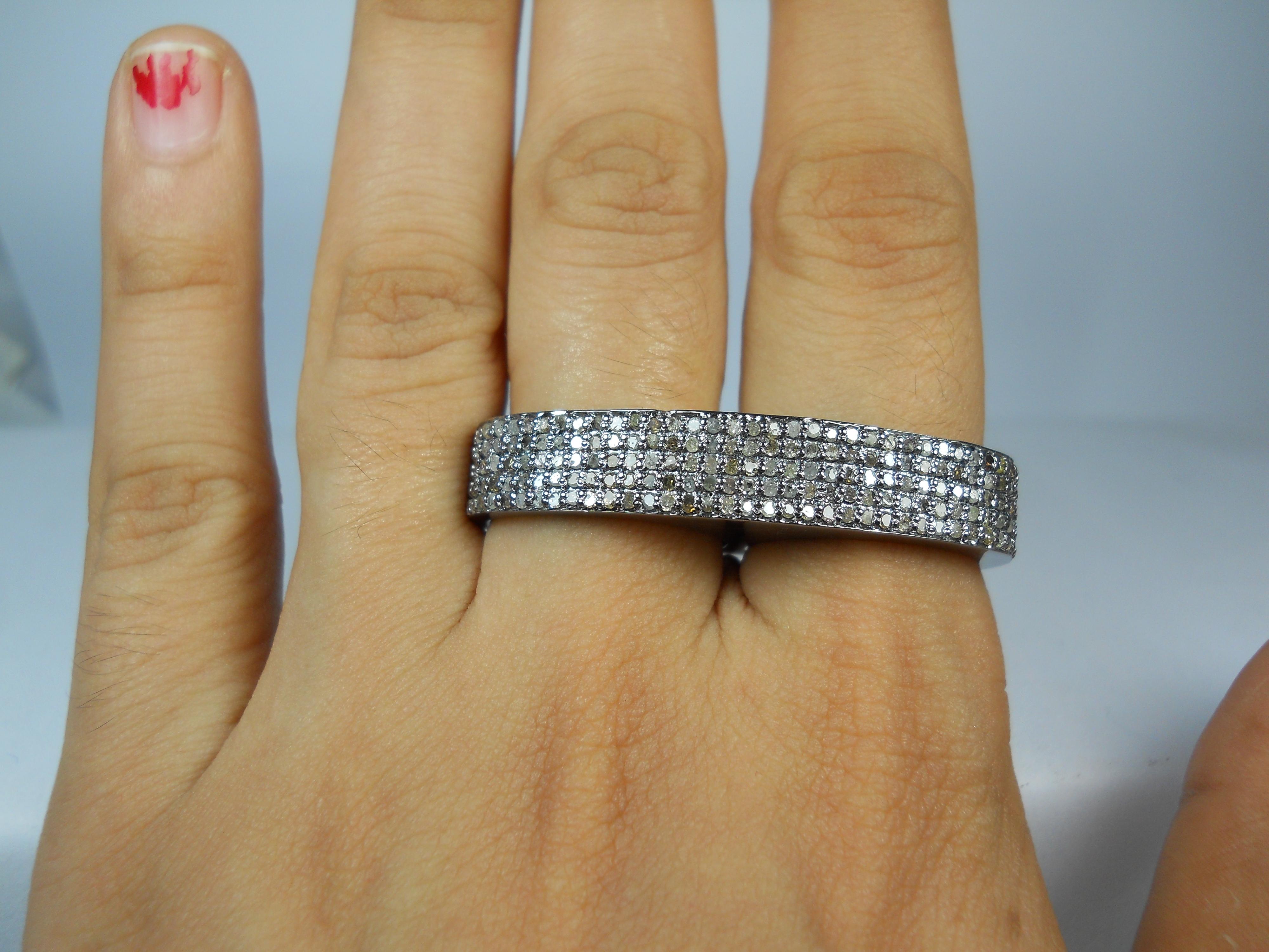 This beautiful two finger ring with natural diamonds consists of:
Diamond= natural pave diamonds
Diamond weight- 1.90cts
Diamond color- white with a tint of grey
Metal- Silver
Purity- 925 (sterling silver)
Metal color- oxidized silver look