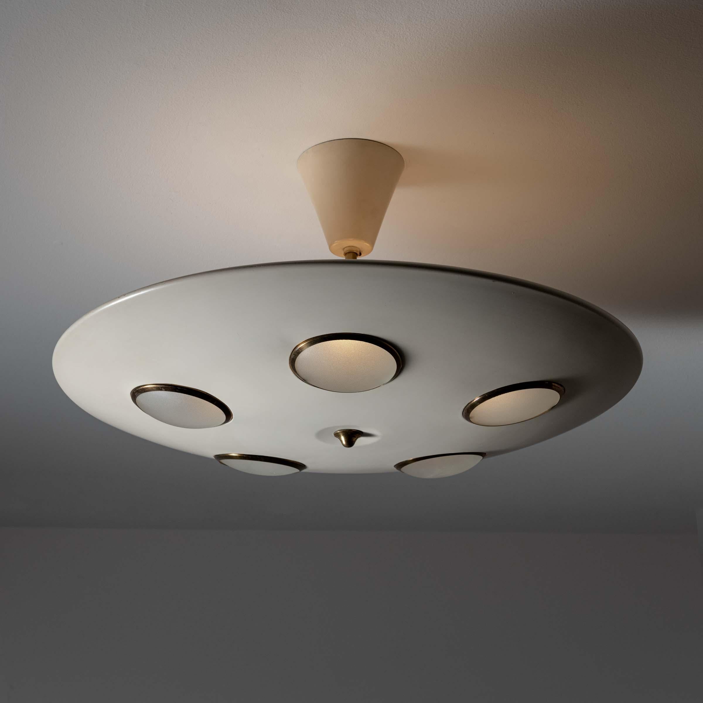 Two Flush Mount ceiling lights by Lumen. Designed and manufactured in Italy, circa 1950's. Enameled metal, glass, brass. Wired for U.S. standards. We recommend five E27 25w maximum bulbs. Bulbs not included. QTY 2 available. PRICED AND SOLD