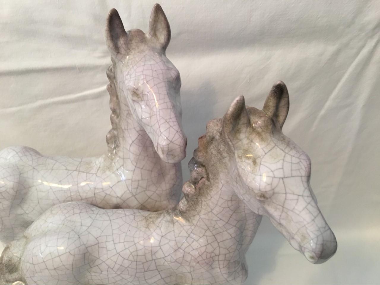 Two lovely foals created by the Masters at Karlsruhe Majolica ceramic. Designed by Eles Bach. Manufactured in the 1960s. Very nice decoration piece.
 