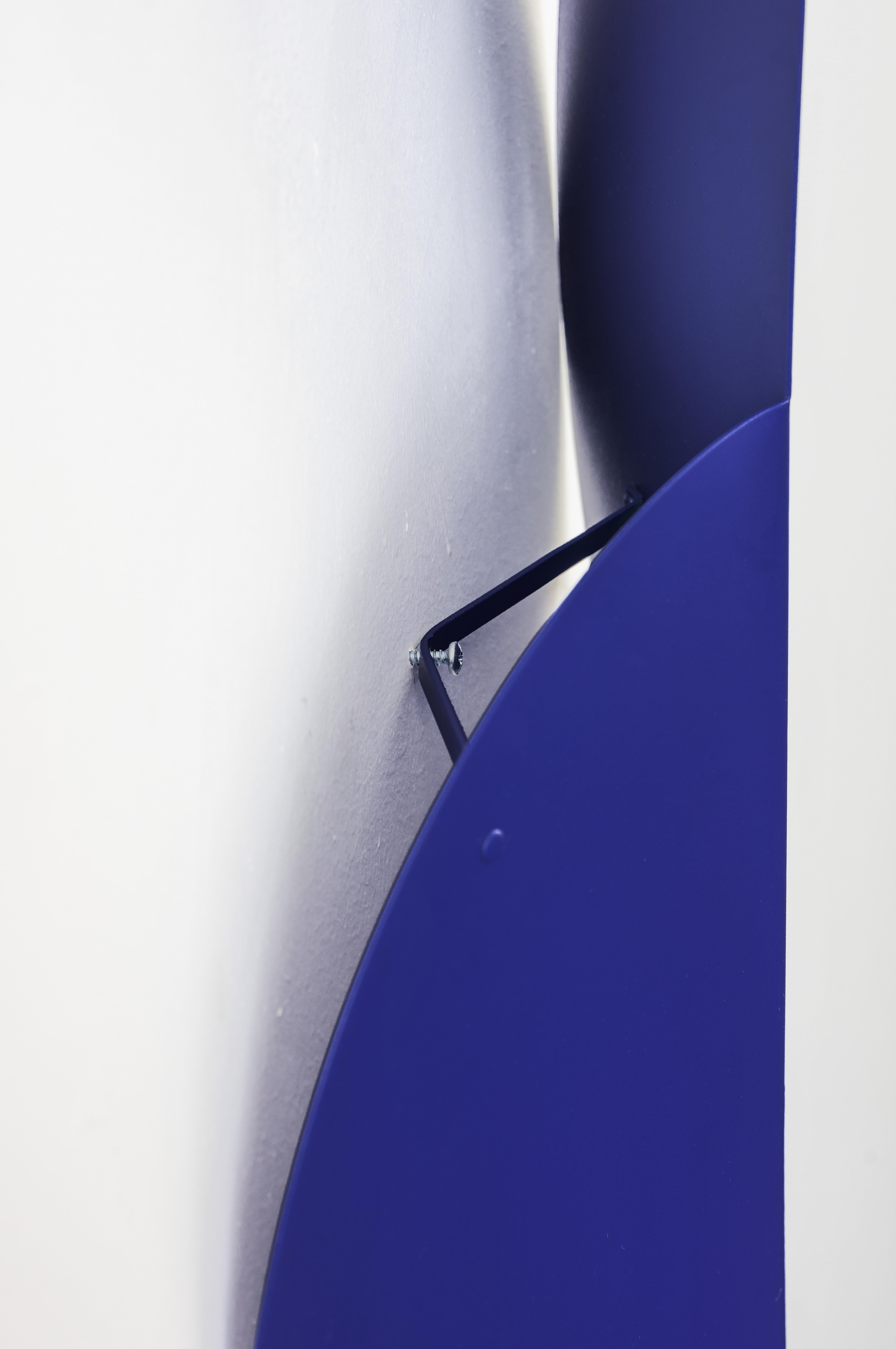 The two fold wall hanging in cobalt is a modern exploration of shape, fold, and color inspired by Bauhaus design principles of simplicity and geometrical form. It can be displayed solo or with other pieces in the Fold Collection. Its powder coating