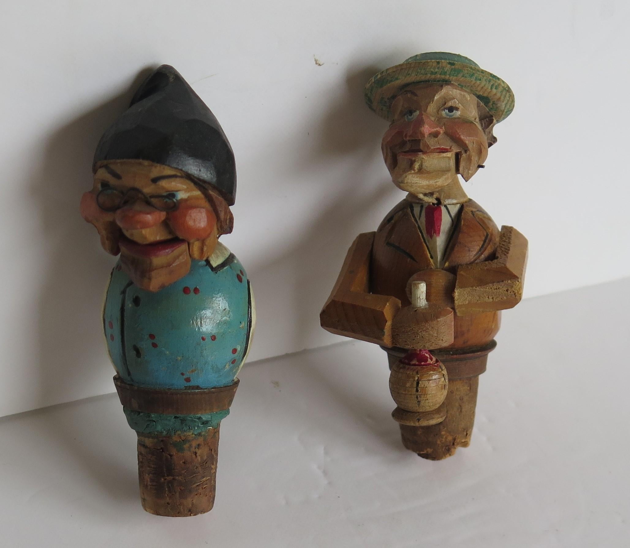 German Two Folk Art Wine Bottle Stoppers Wood Hand Carved Articulated, circa 1930
