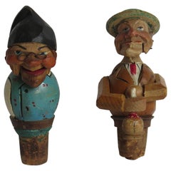 Two Folk Art Wine Bottle Stoppers Wood Hand Carved Articulated, circa 1930