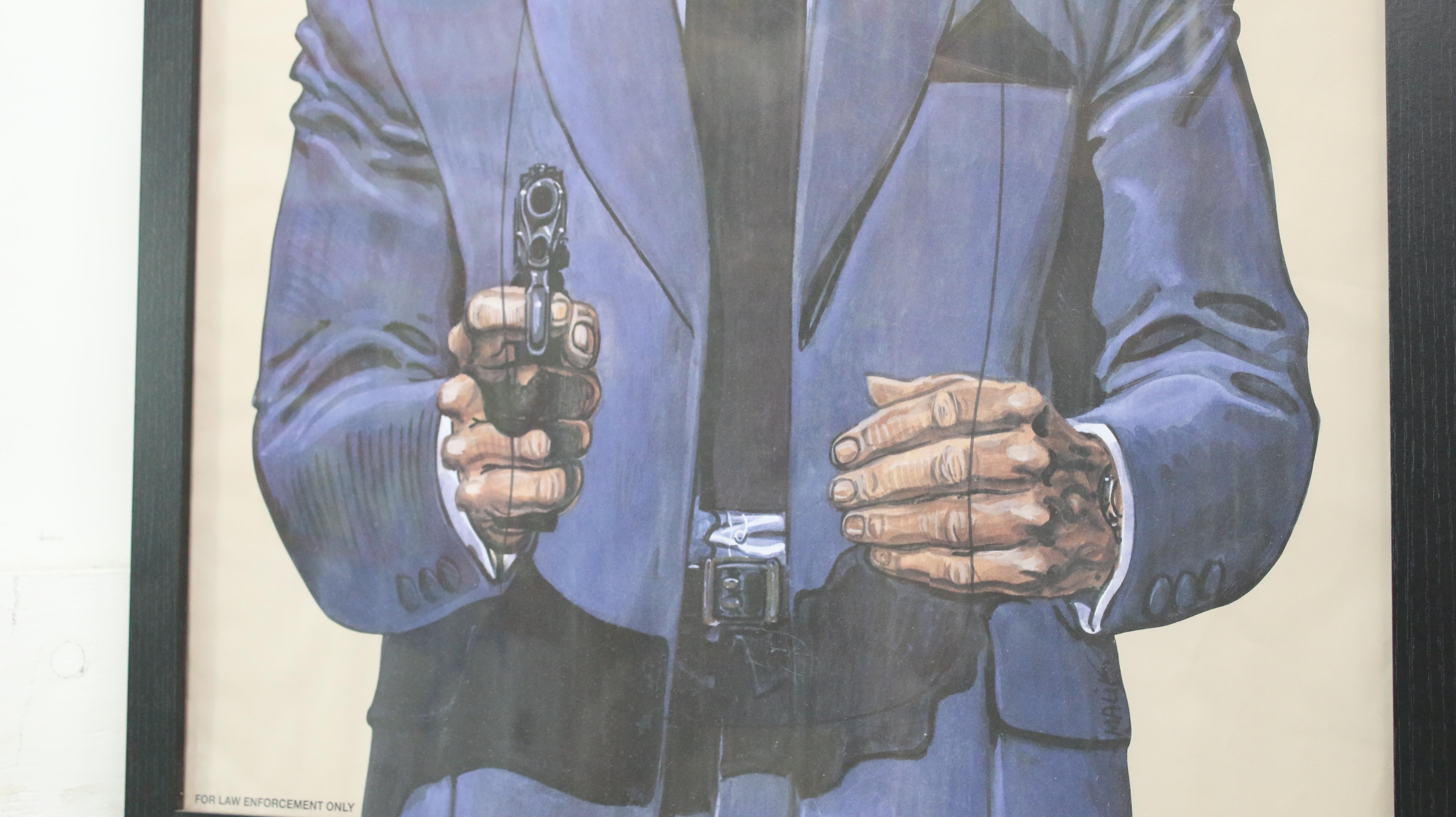 Two Framed Police Shooting Target Gun Range Posters by Malik In Good Condition For Sale In STOKE ON TRENT, GB