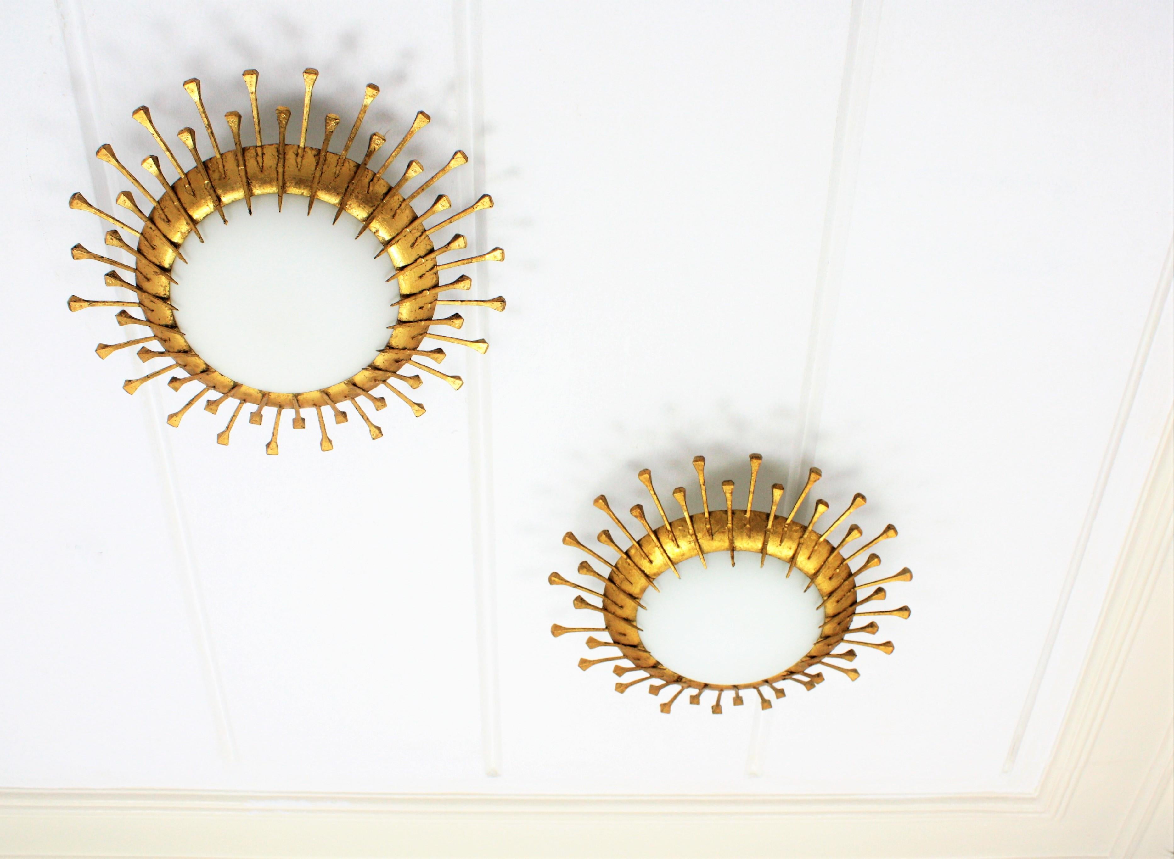 Two French 1940s Gilt Iron Milk Glass Sunburst Light Fixtures with Nails Details 8