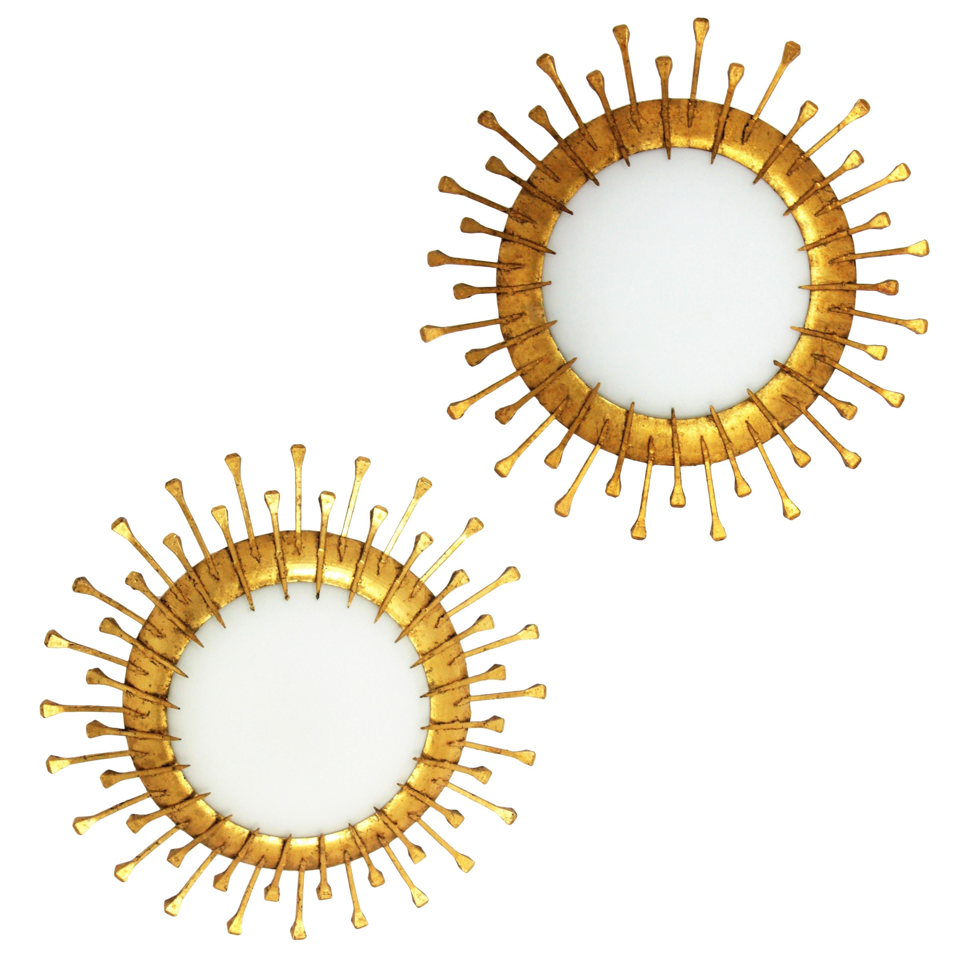 Two French 1940s Gilt Iron Milk Glass Sunburst Light Fixtures with Nails Details