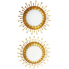 Two French 1940s Gilt Iron Milk Glass Sunburst Light Fixtures with Nails Details