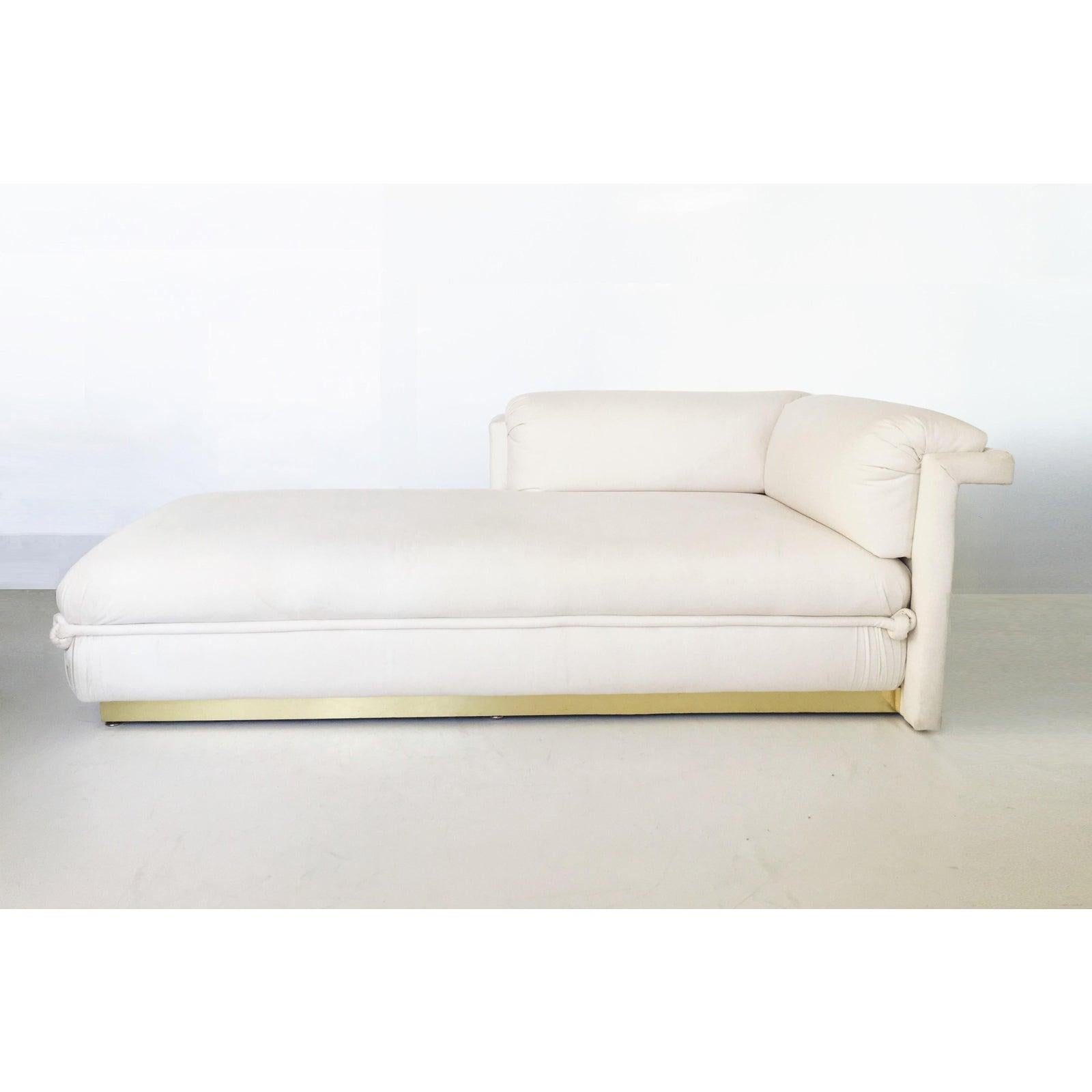 Offered are two French Art Deco chaise lounges with brass base. These exquisite chaise lounges that combine the most contemporary shape. Professionally upholstered with beautiful rope detailing and raised upon brass plinth base so they appear to