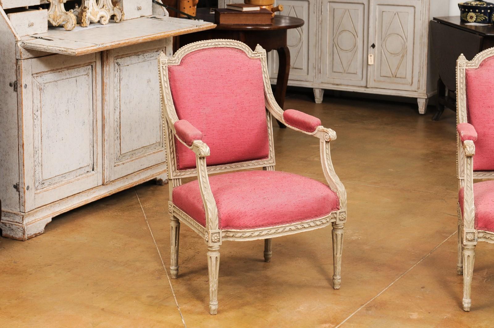 Two French Louis XVI Style Painted Armchairs with Richly Carved Décor, Sold Each In Good Condition For Sale In Atlanta, GA