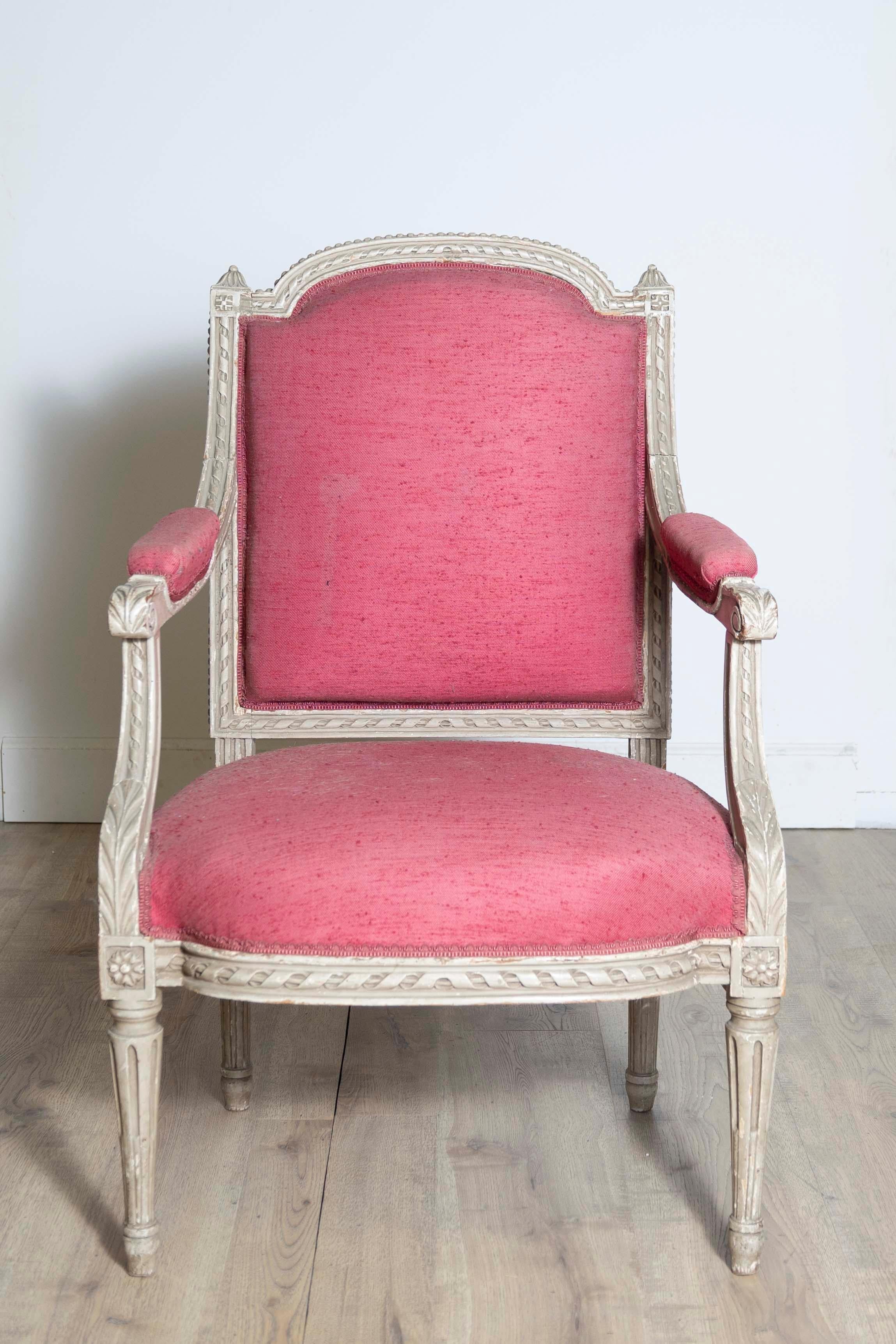 Two French Louis XVI Style Painted Armchairs with Richly Carved Décor, Sold Each In Good Condition For Sale In Atlanta, GA