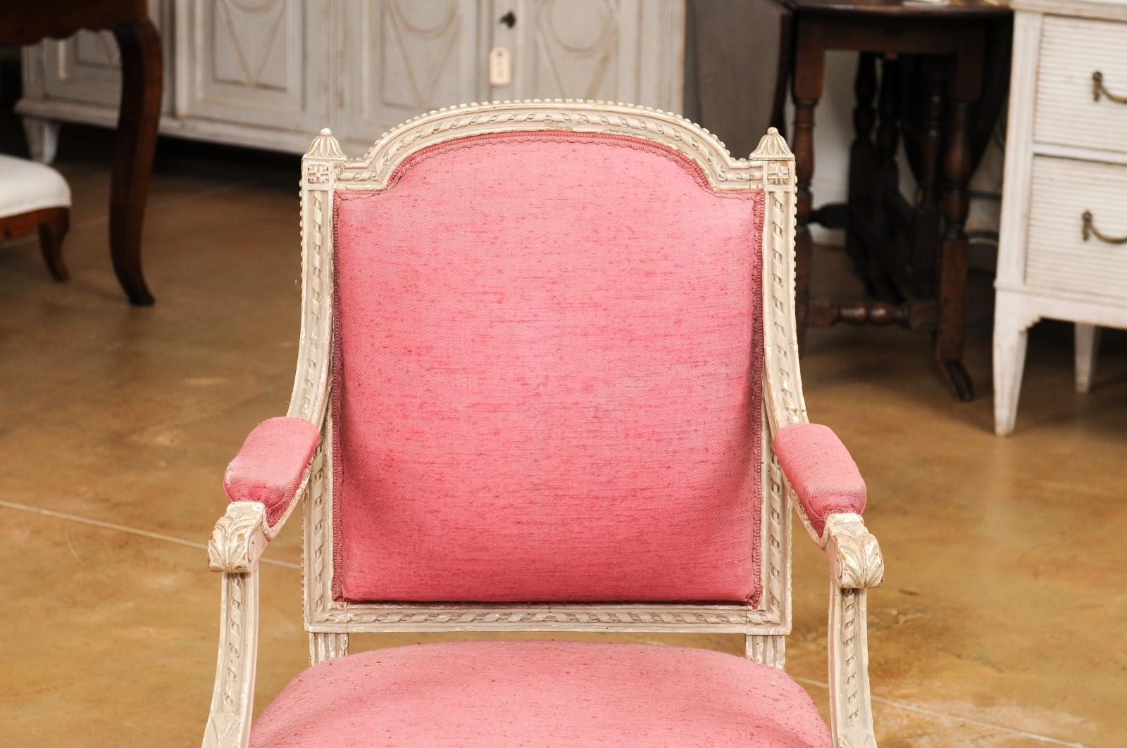 Two French Louis XVI Style Painted Armchairs with Richly Carved Décor, Sold Each For Sale 1
