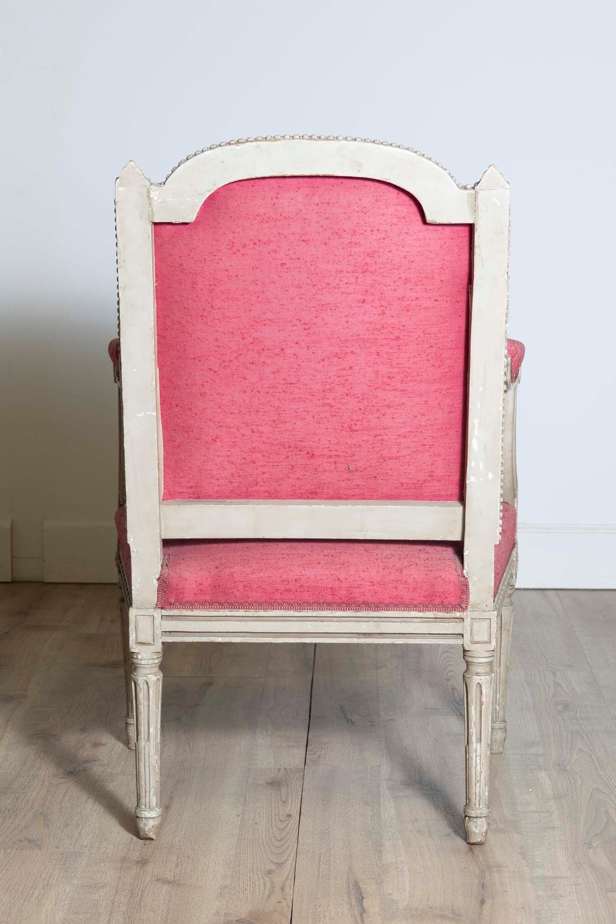 Two French Louis XVI Style Painted Armchairs with Richly Carved Décor, Sold Each For Sale 1