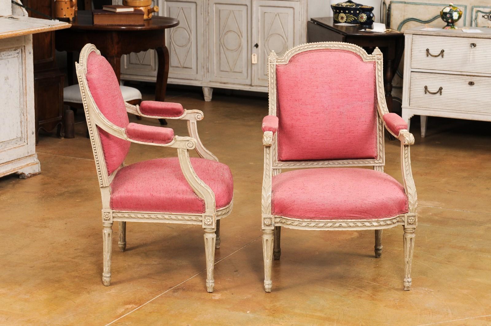 Two French Louis XVI Style Painted Armchairs with Richly Carved Décor, Sold Each For Sale 2
