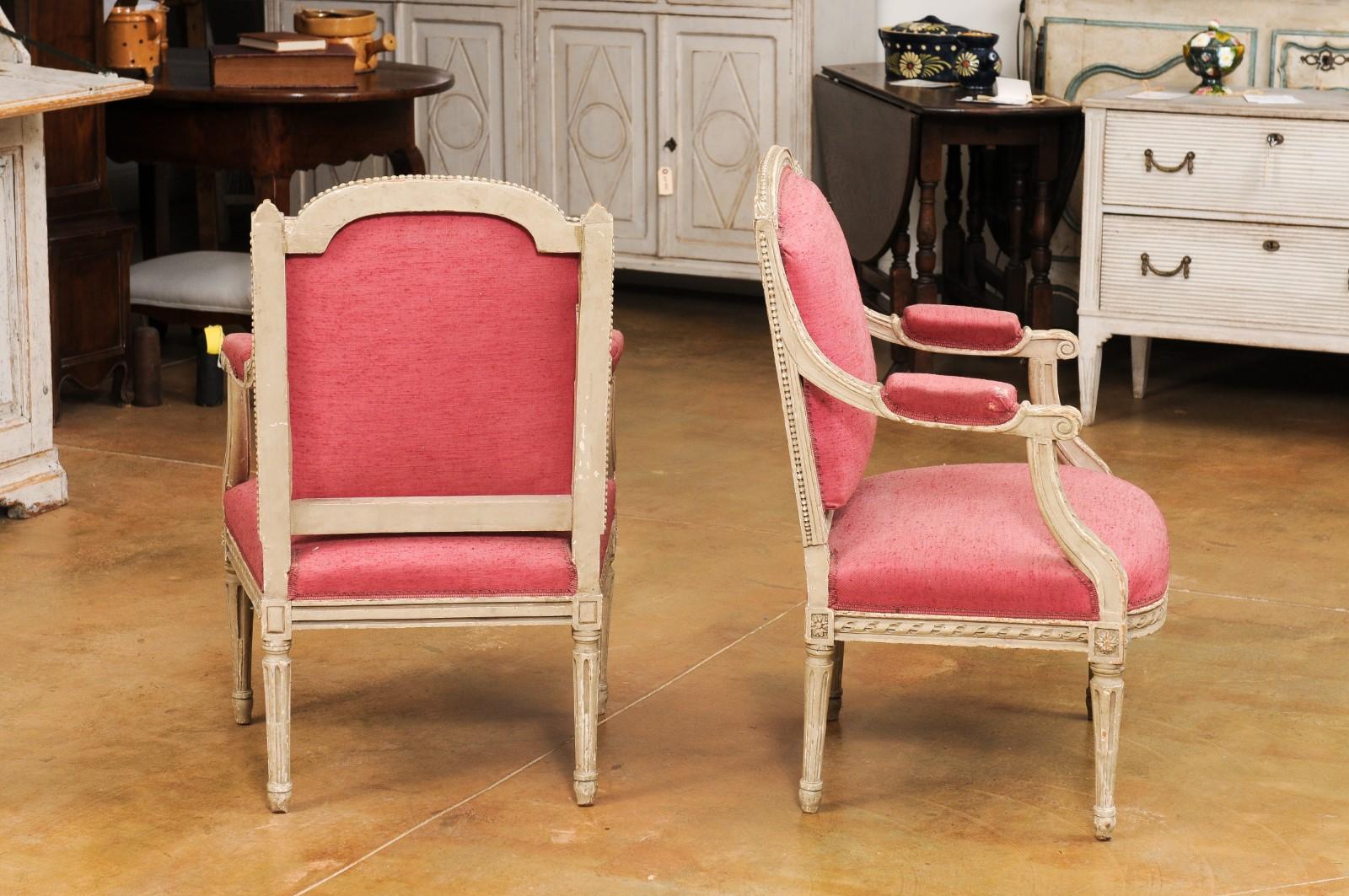 Two French Louis XVI Style Painted Armchairs with Richly Carved Décor, Sold Each For Sale 3