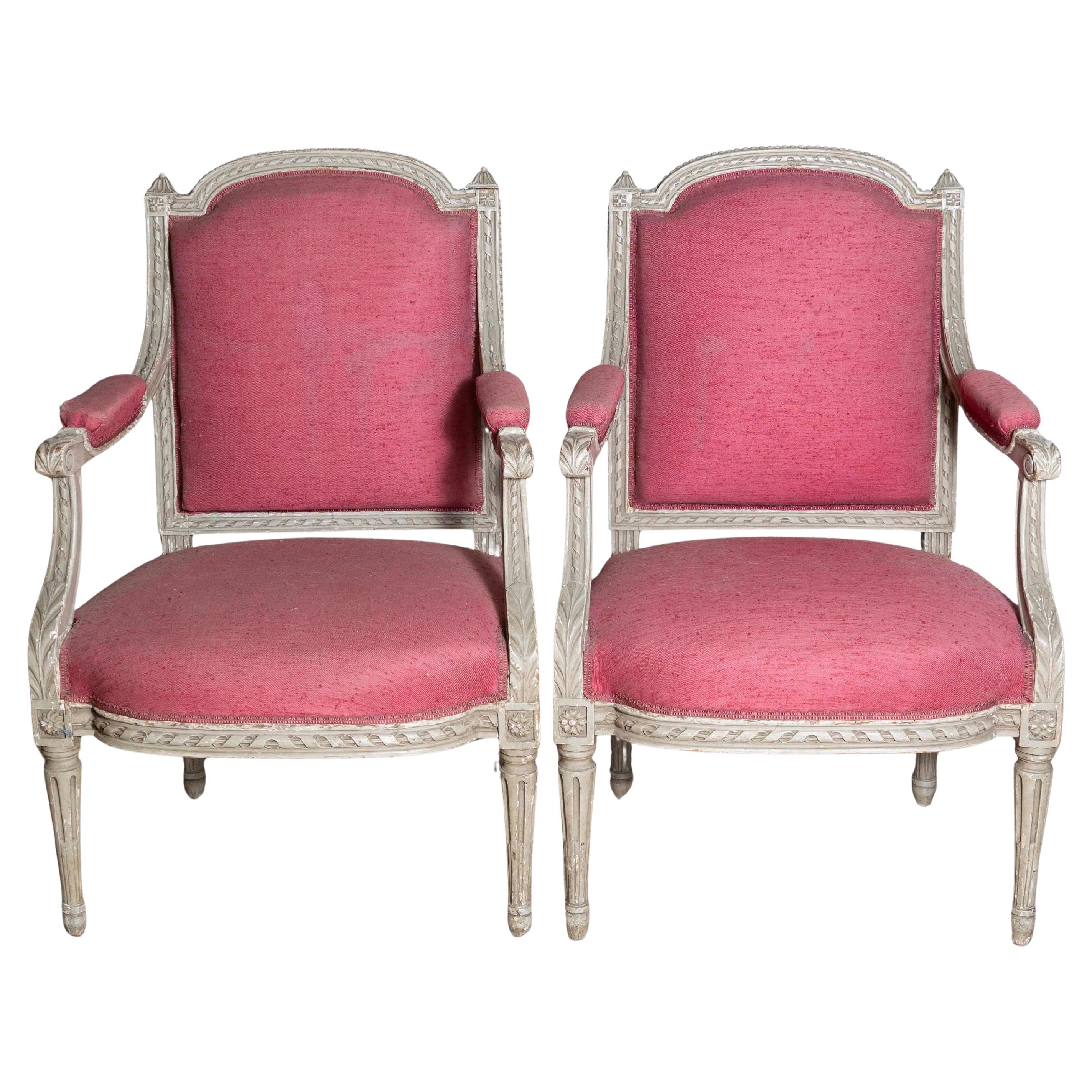 Two French Louis XVI Style Painted Armchairs with Richly Carved Décor, Sold Each For Sale
