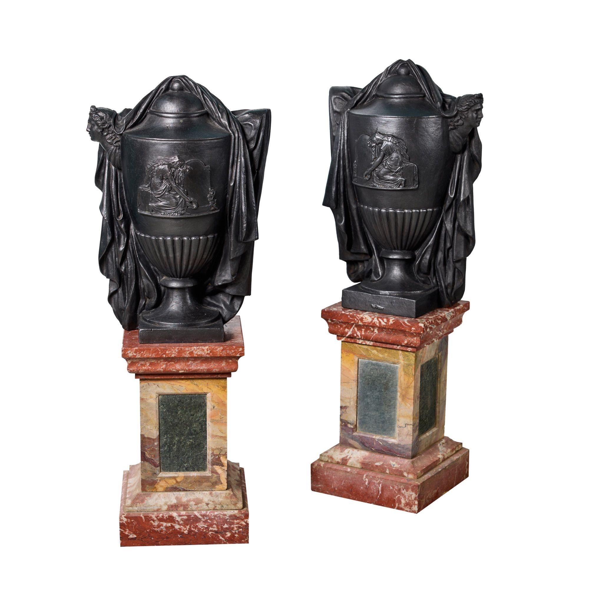 Two French Neoclassical Cast Iron Urns on Marble Pedestals 1