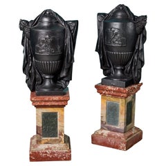 Two French Neoclassical Cast Iron Urns on Marble Pedestals