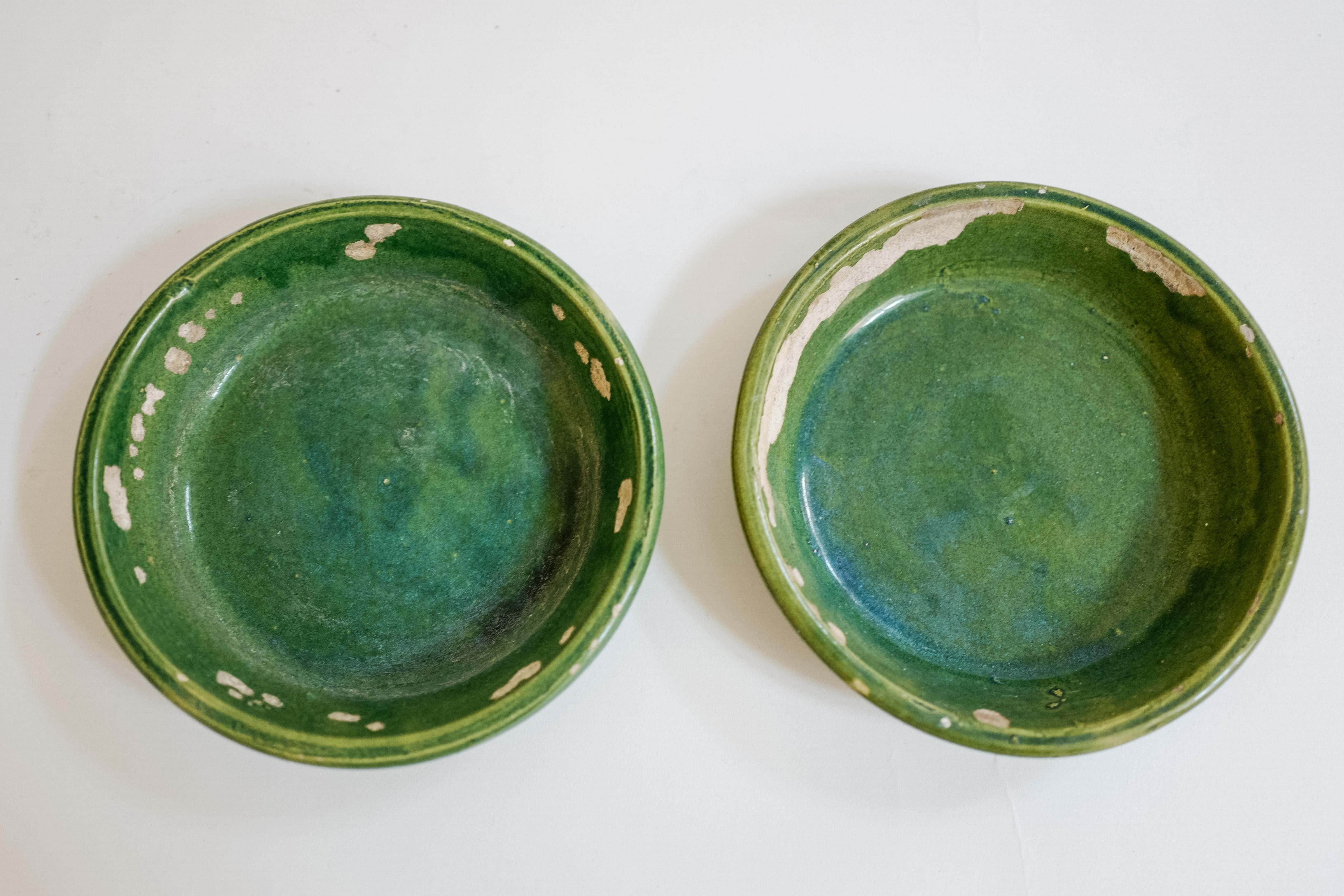 A pair of French Provincial Ceramic Painted Green Round Small Serving Platters circa 19th Century. Could be used for serving snacks or as an ashtray or even a catch all. 