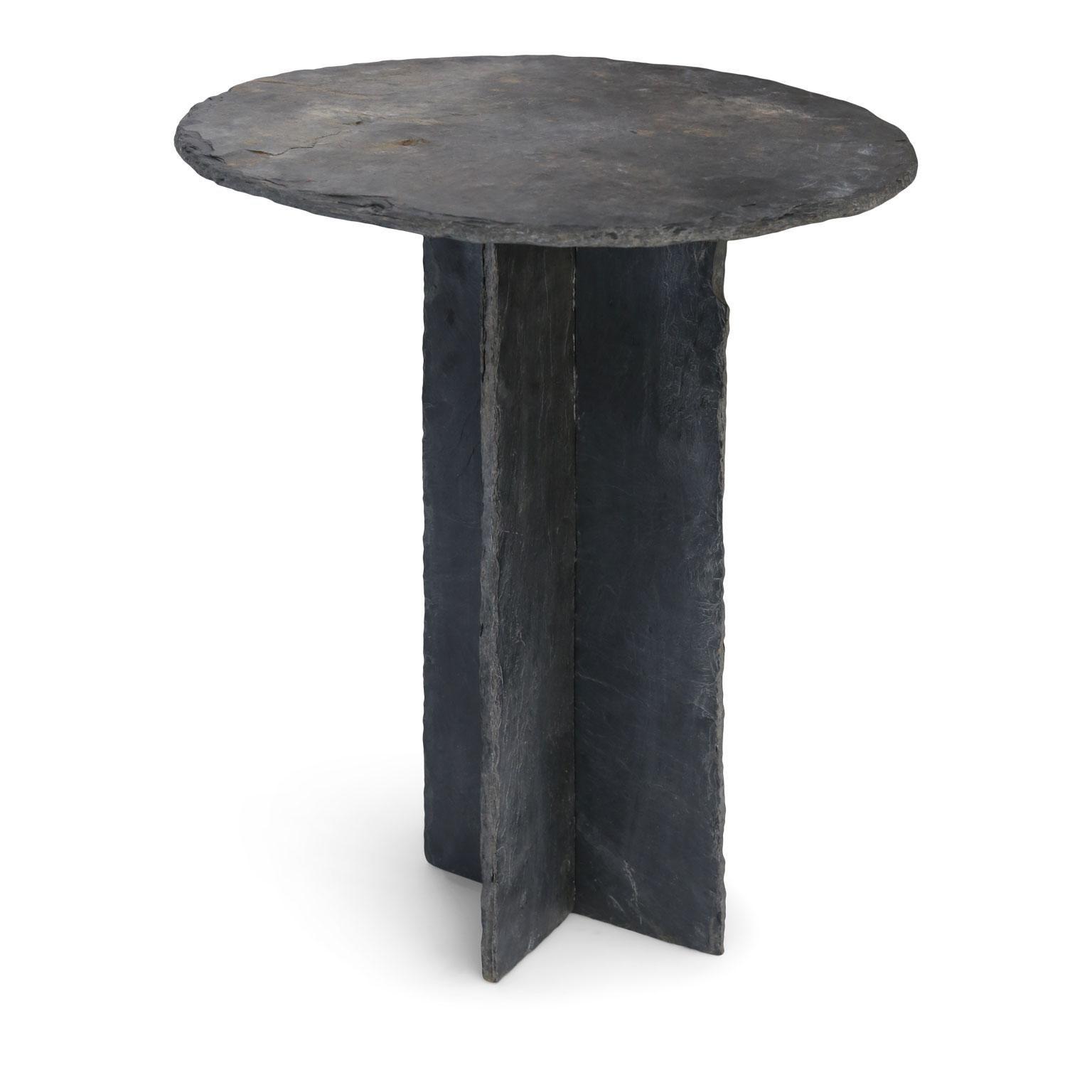 Two French tables d'ardoise: vintage round top slate side tables. Each slate top rests upon a two-piece slate base that crosses and connects in its center.