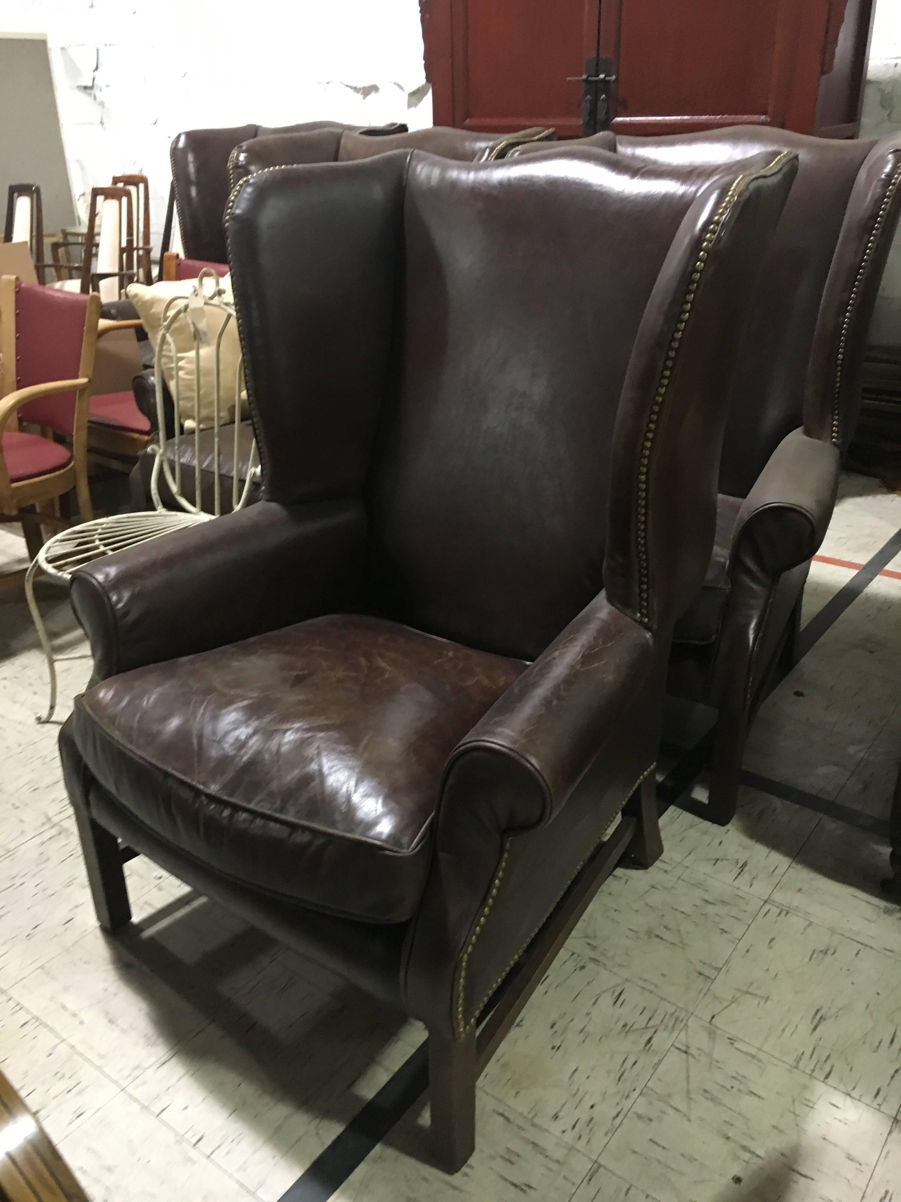 20th Century Two George III Style Wingback Chairs with Distressed Leather Priced Per Chair