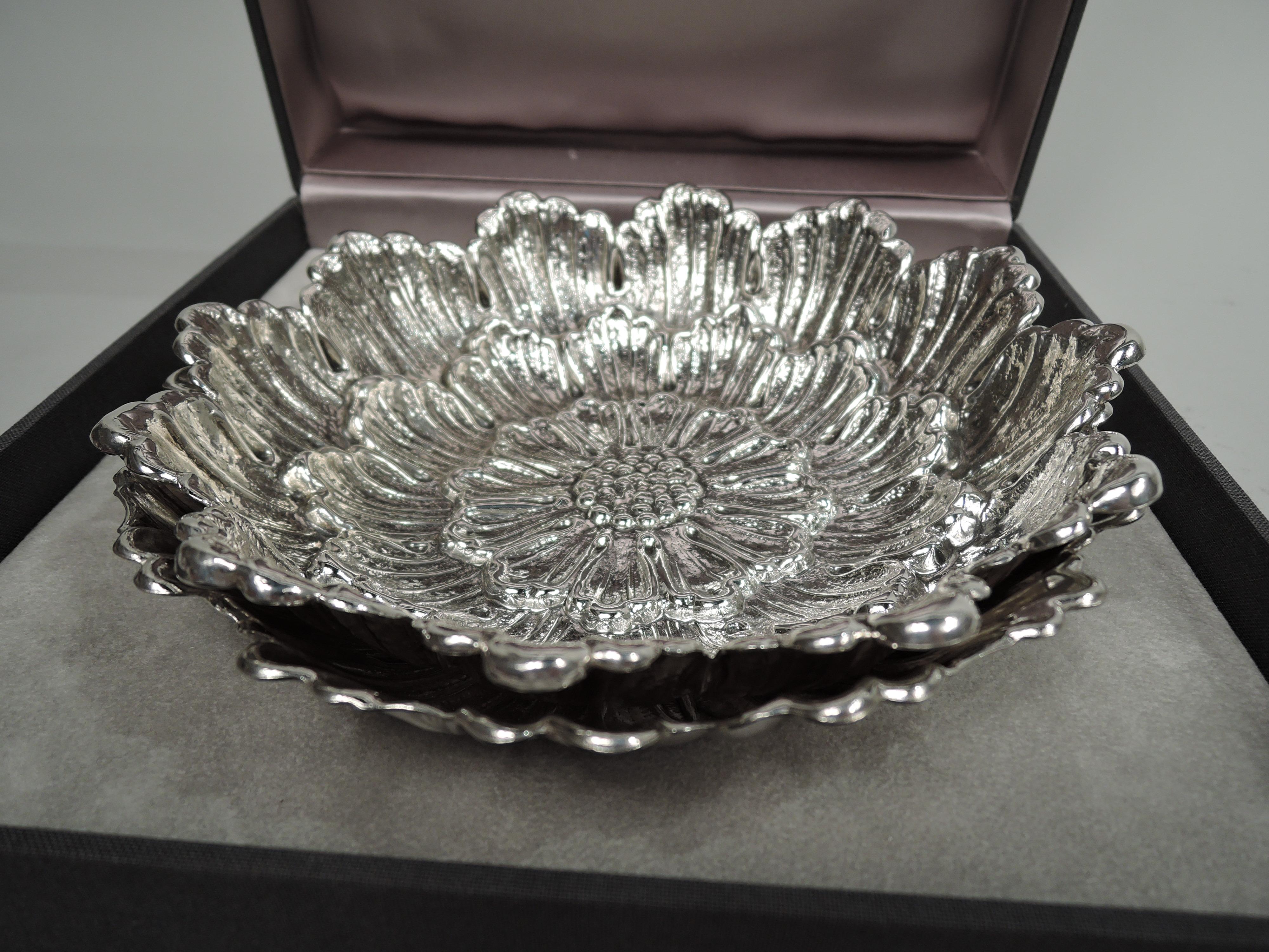 Two sterling silver flower head bowls. One is collage-style with 3 graduated layers of fluted, striated, and irregular petals and beaded center. The other has fluted and irregular petals with collage-style center comprising 2 graduated and scalloped