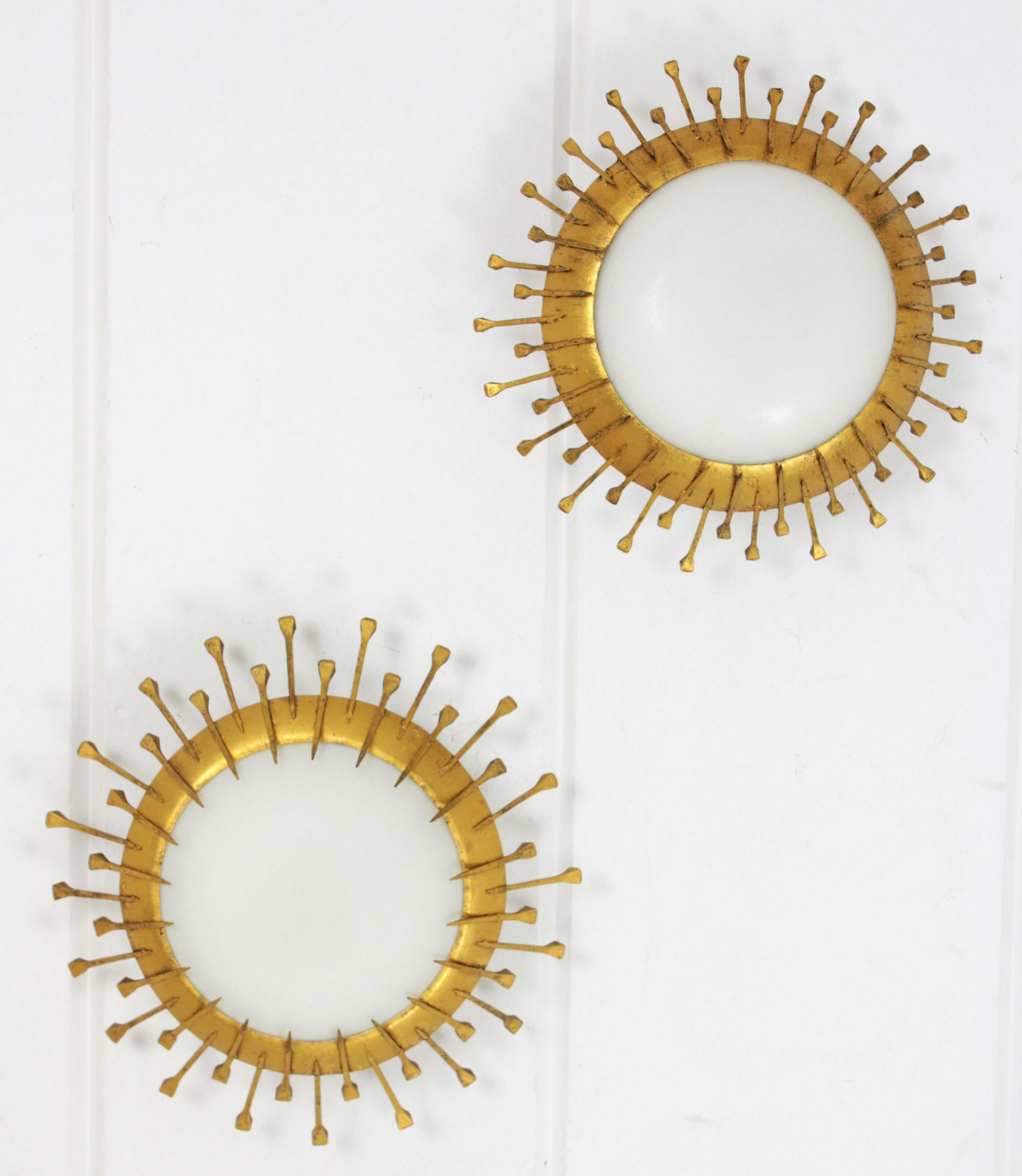 Two Gilt Iron Milk Glass Sunburst Light Fixtures with Nail Details, France 1940s In Excellent Condition In Barcelona, ES