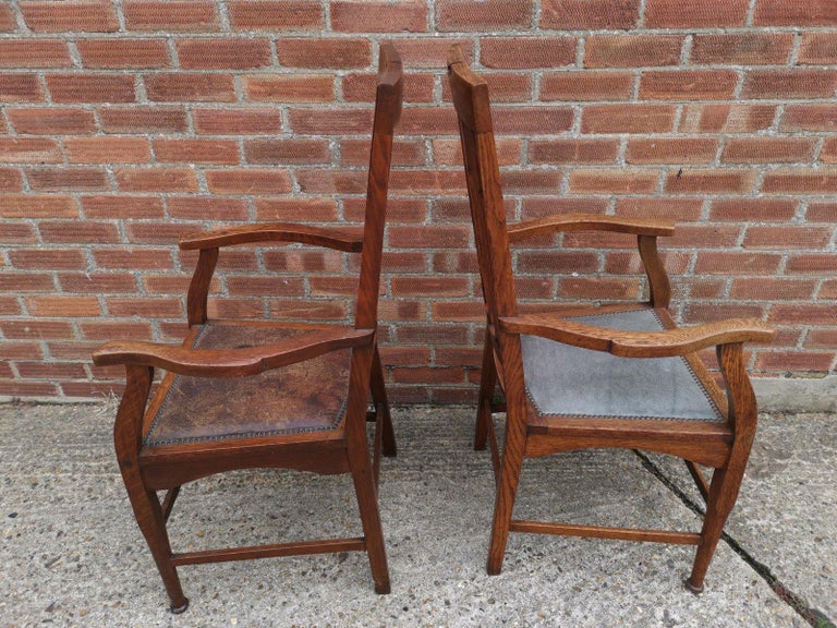 Two Glasgow Style Arts and Crafts Oak Armchairs and a Single Matching