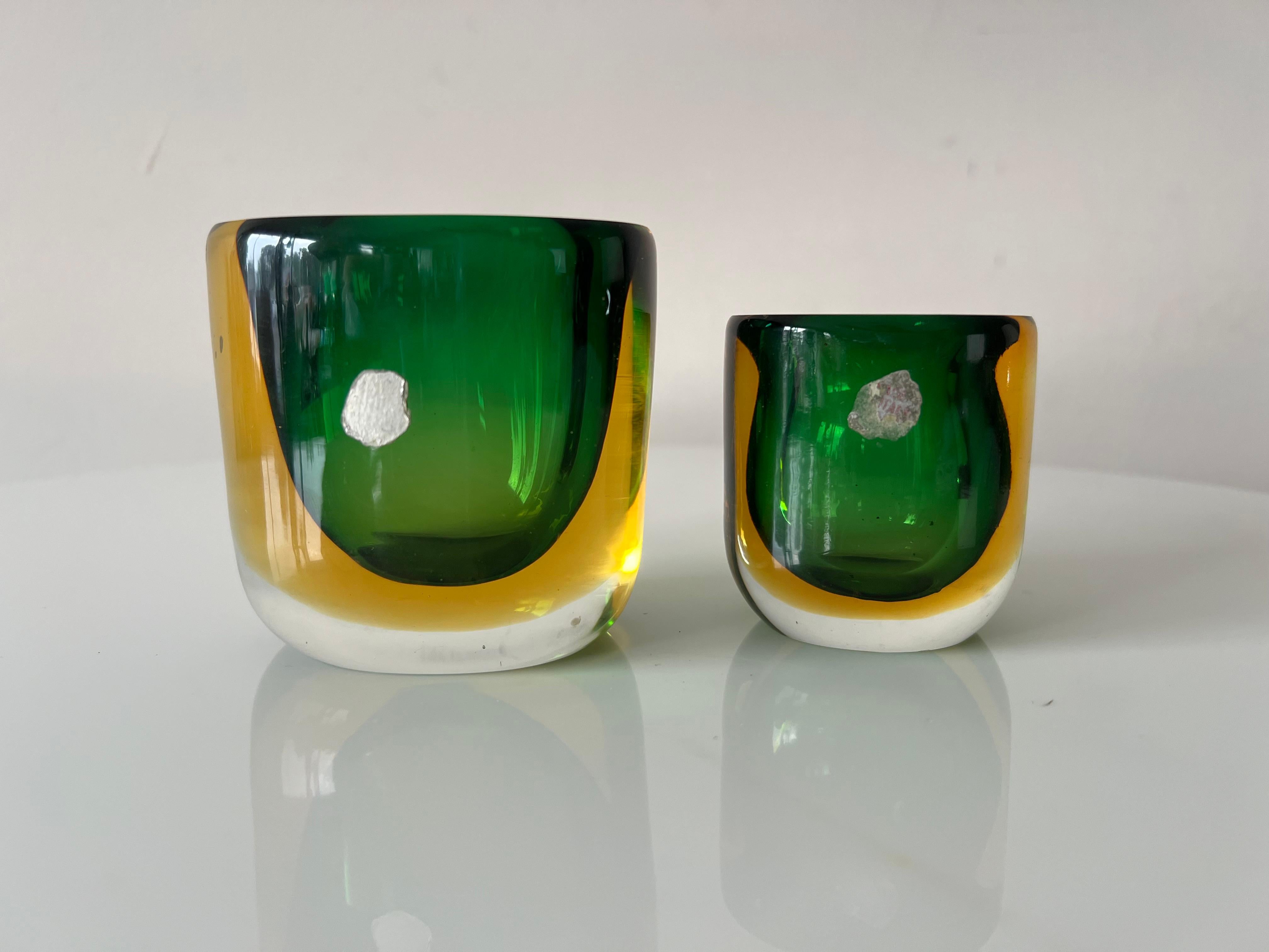 Two charming sommerso vases, probably by Flavio Poli, ca' 1950's. Old Murano stickers (faded). Big brother-little brother, green, amber and clear glass, fused in sommerso technique.