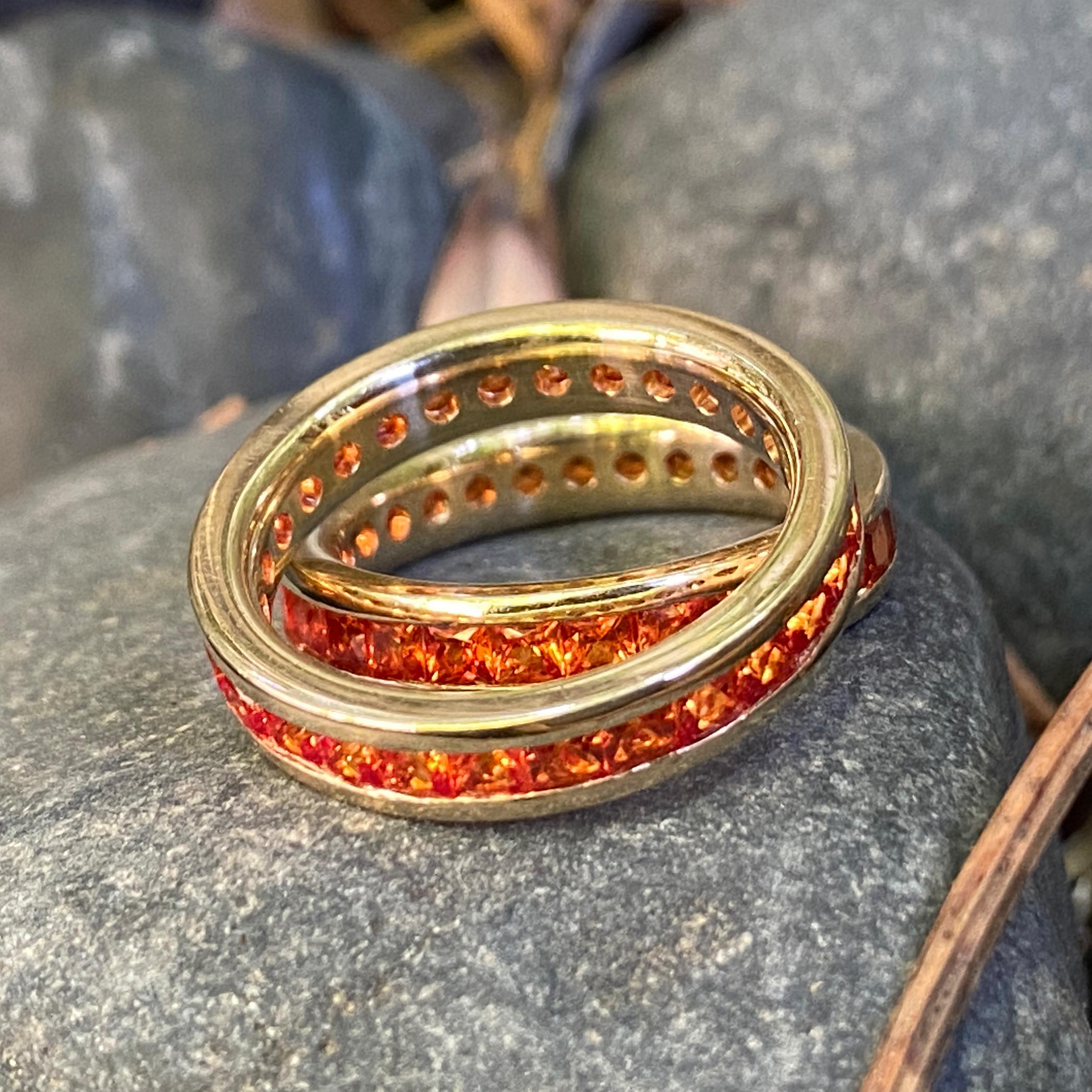 Contemporary Two Gold Eternity Stacker Bands with Channel-Set Square Cut Orange Sapphires For Sale