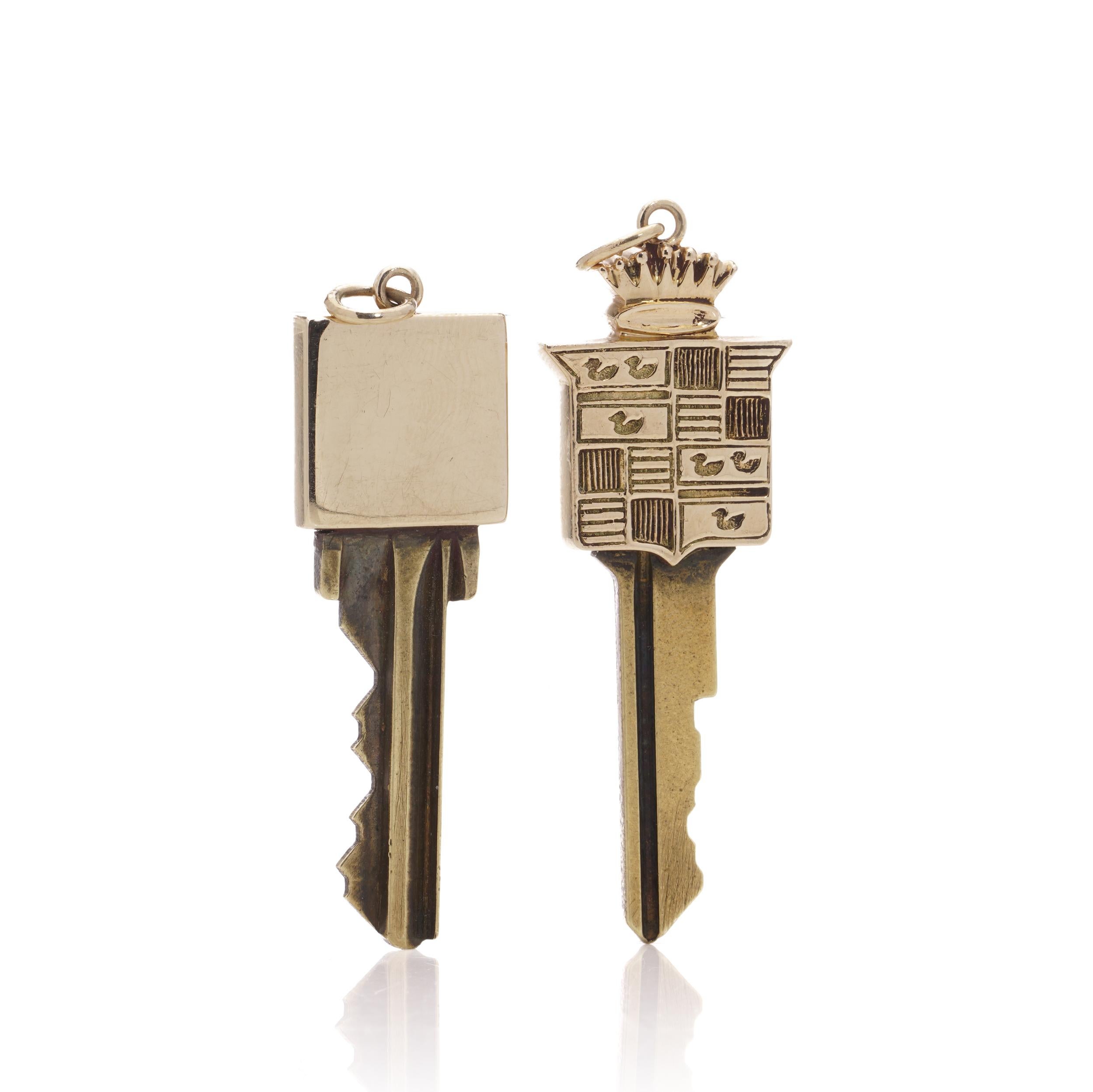 Women's or Men's Two gold mounted keys, one with Cadillac logo design finial, Tiffany & Co. 14kt. For Sale