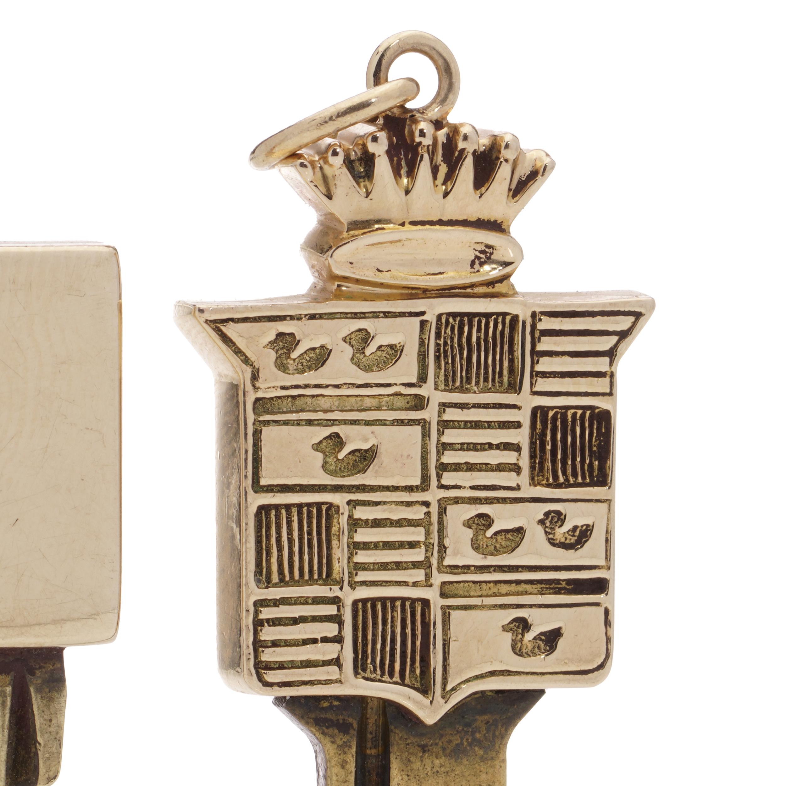 Two gold mounted keys, one with Cadillac logo design finial, Tiffany & Co. 14kt. For Sale 1