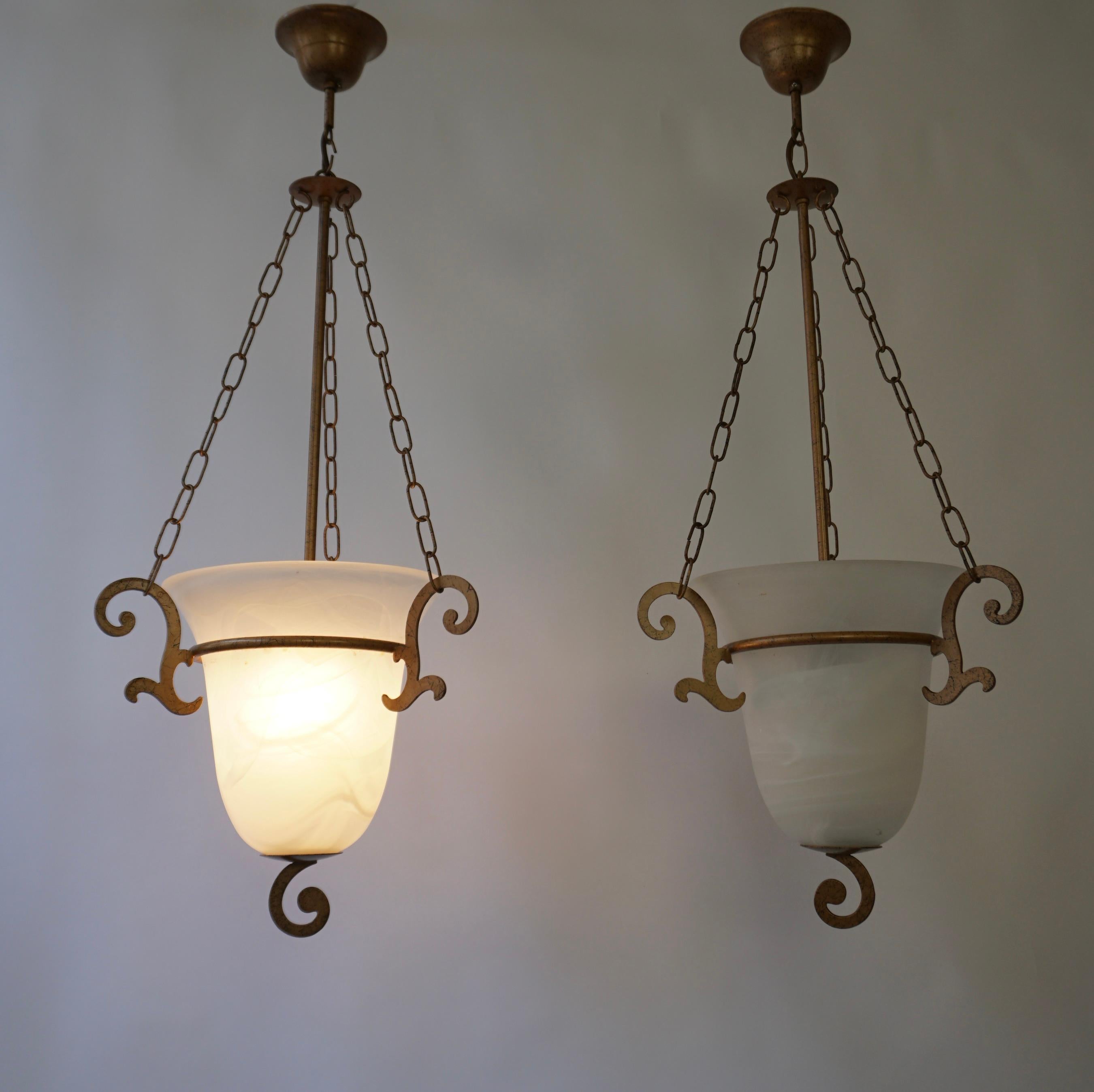 Two Greek style glass chandeliers, made in the 20th Century. The fixture is custom, and classically styled with an dark rubbed bronze gold finish. The glass bowl is 9.8″ diameter, 9.4″ deep.

The light has one socket for incandescent lamps with