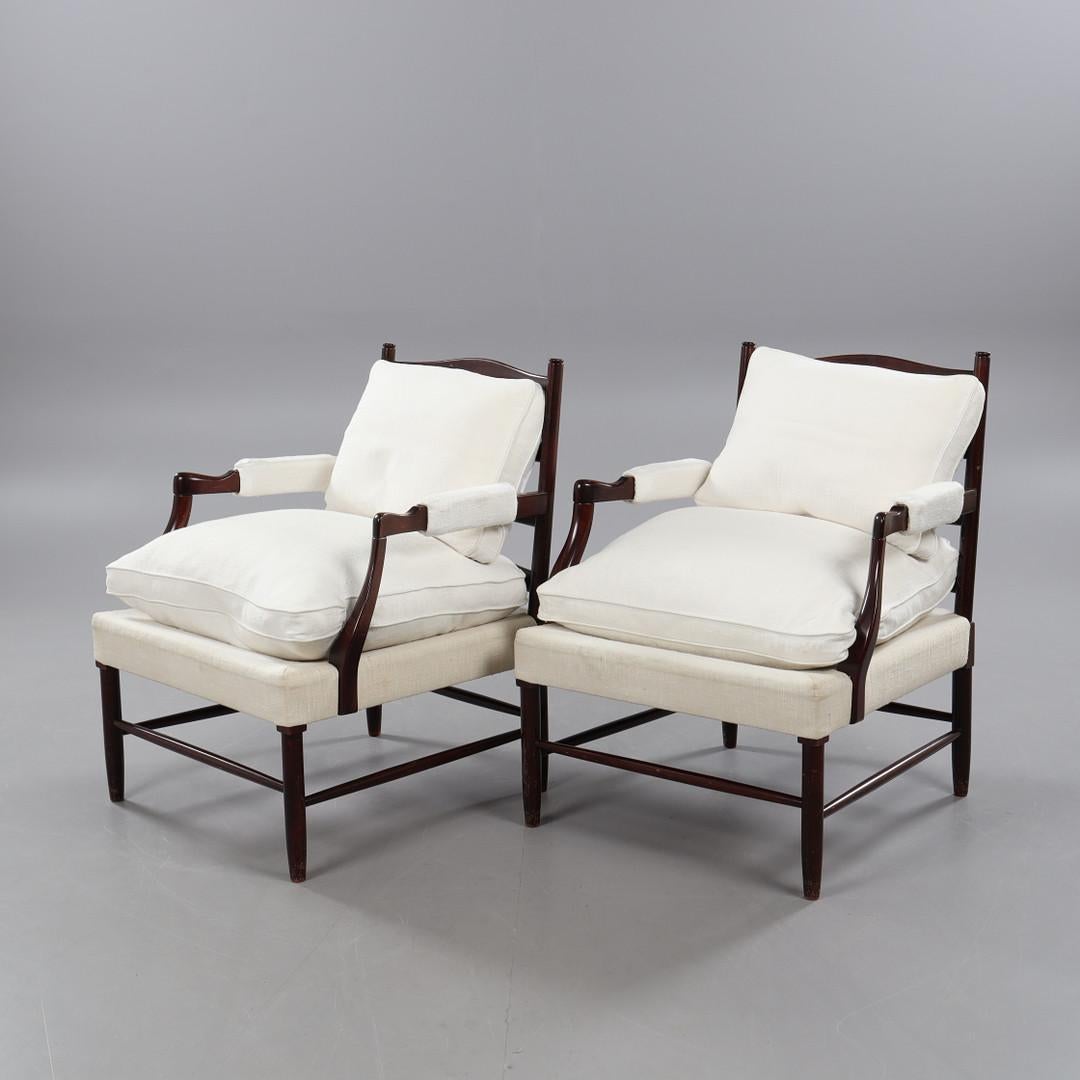 Paire de fauteuils Gripsholm, Arne Norell. Revêtement en lin blanc cassé. Bon état - En vente à BARCELONA, ES