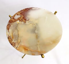 Deux guéridons en bronze et onyx