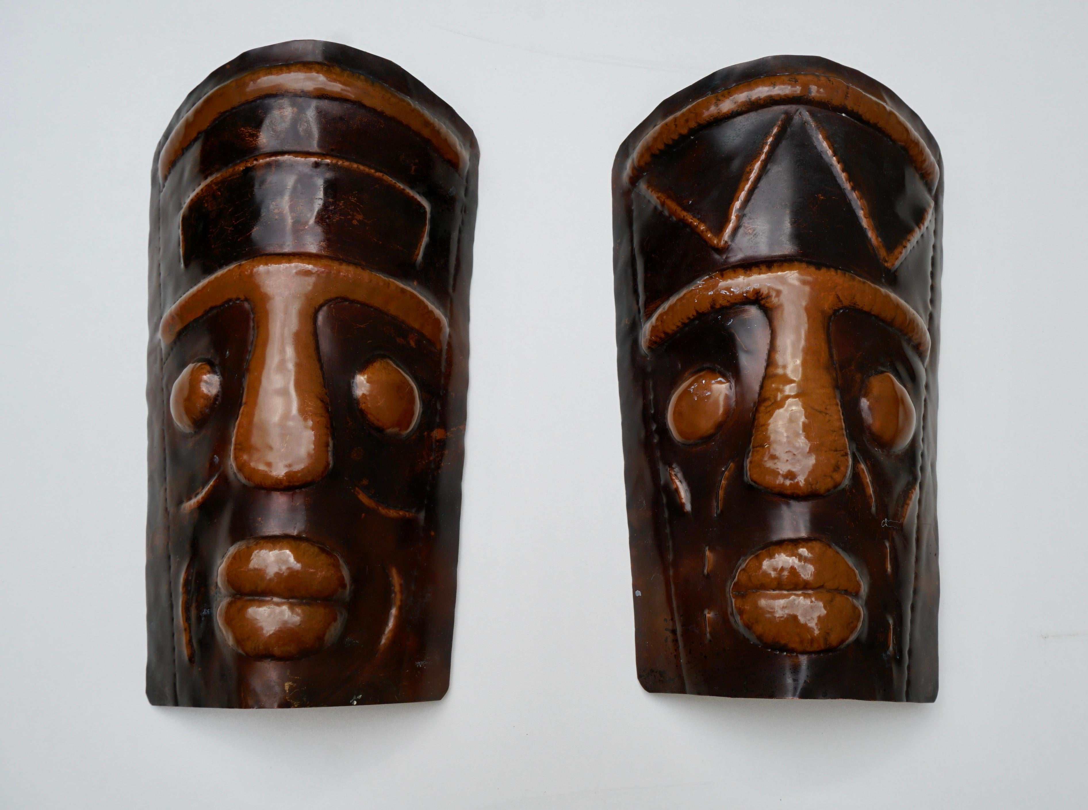 Mid-Century Modern Two Hammered Copper Sconces in the Shape of African Masks For Sale
