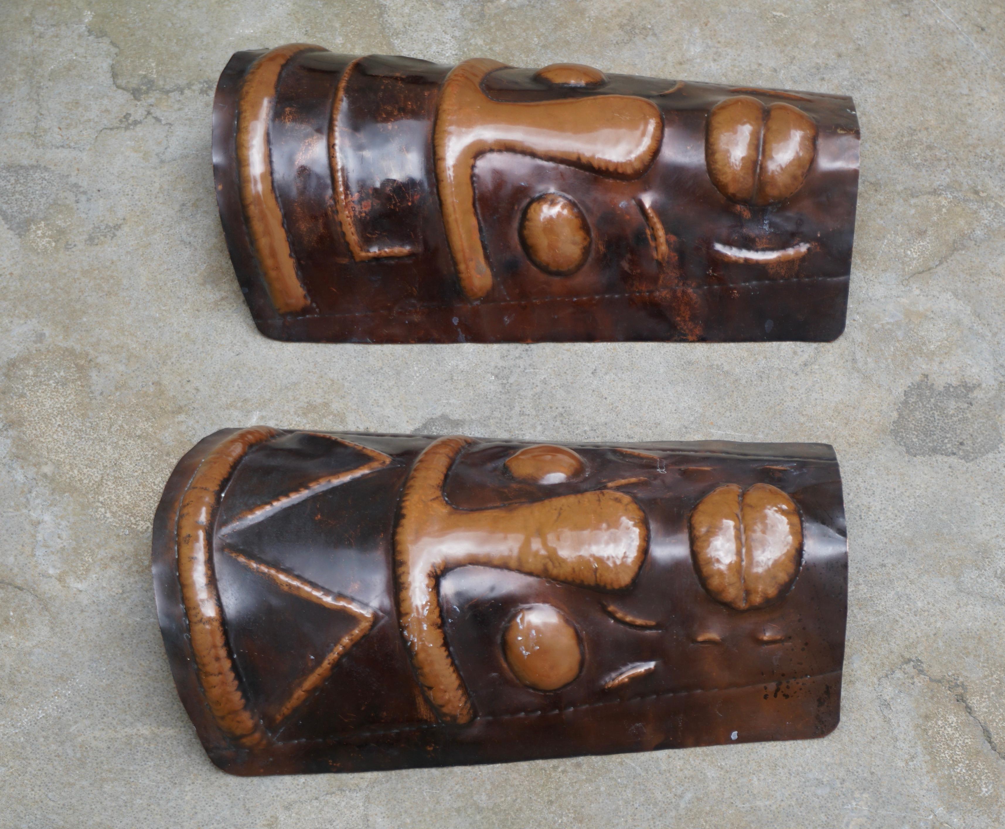 20th Century Two Hammered Copper Sconces in the Shape of African Masks For Sale