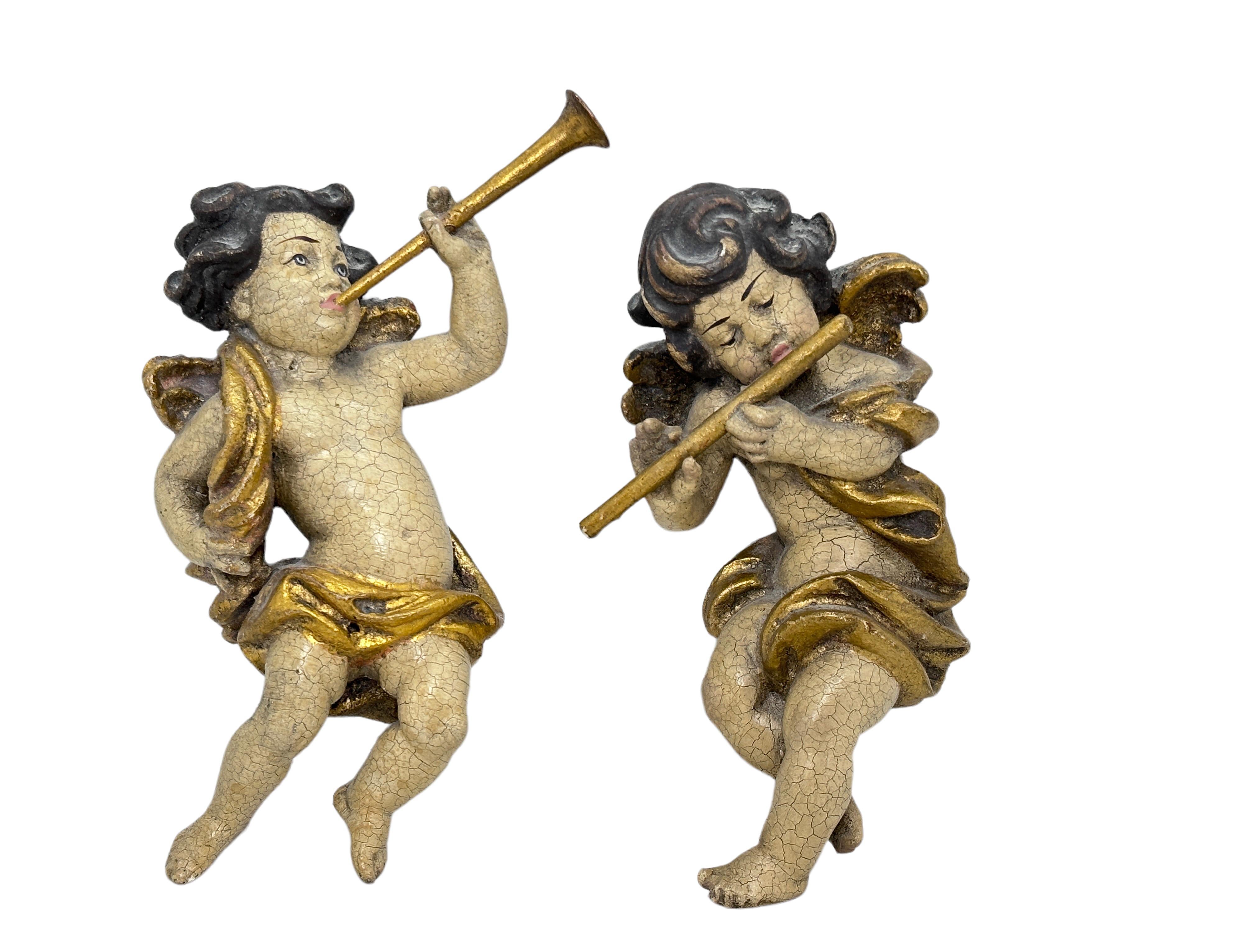 Deux chérubins musiciens sculptés à la main jouant de la trompette et de la flûte, Italie, années 1950