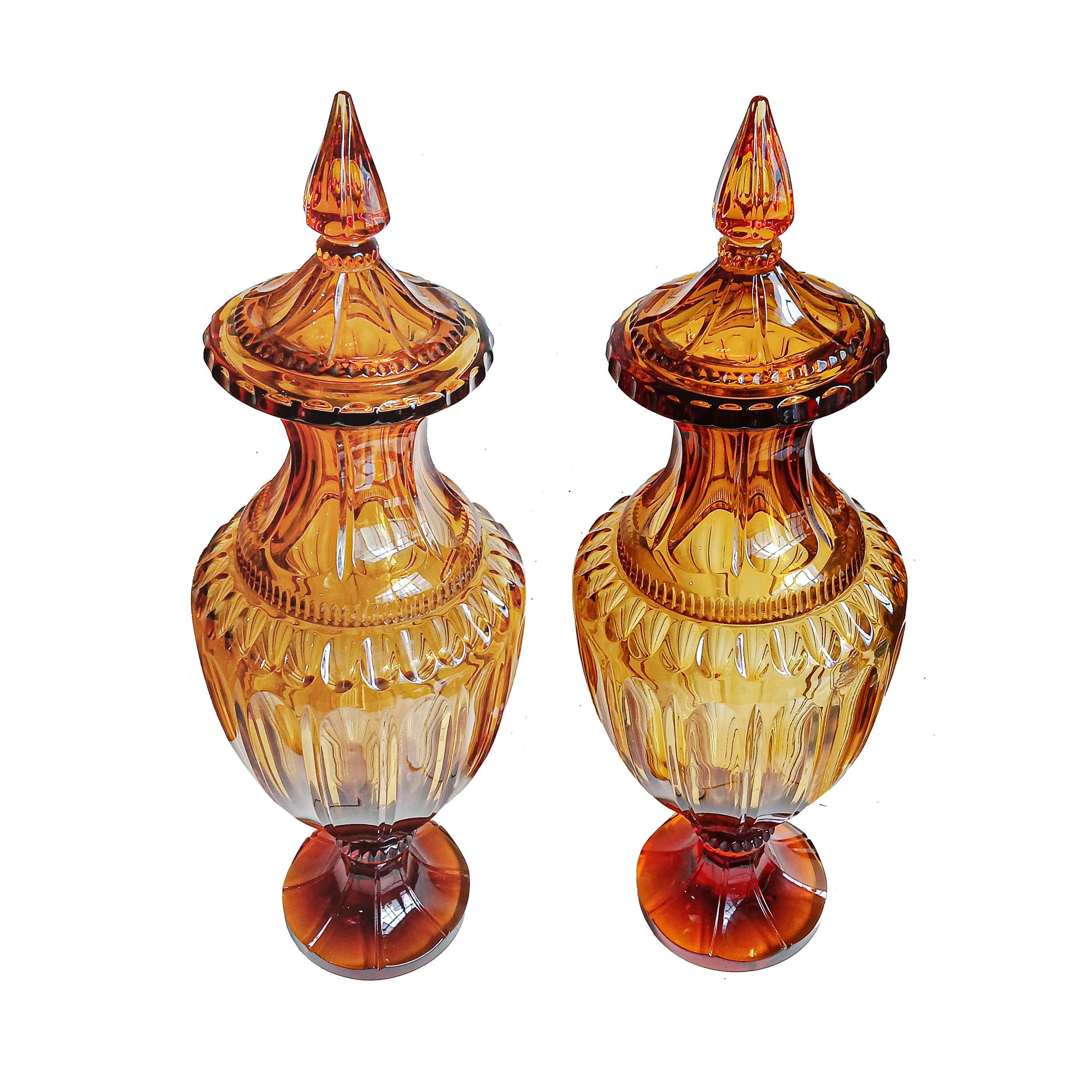 Two superb Amber crystal vases, hand-crafted to order in Treviso, Italy, by Unique Luxury Designs, renowned manufacturer of bespoke crystal chandeliers, home accessories and crystal art. 

Both vases are entirely hand-made in amber-colored 24% lead