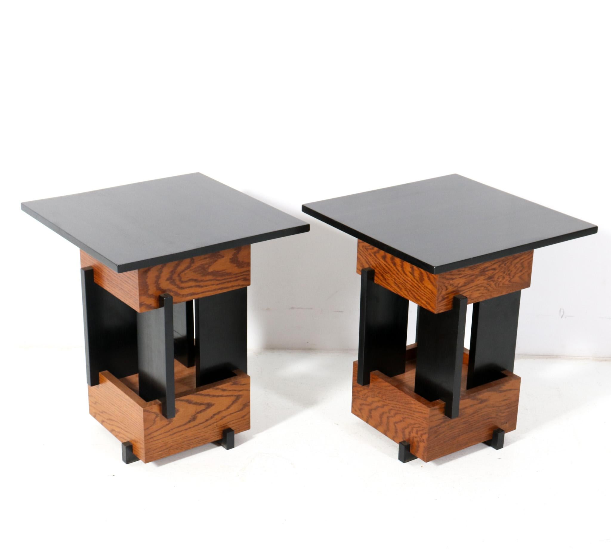 Magnificent and rare pair of handmade Art Deco Modernist side tables.
The original design is by Cor Alons around the 1930s but this pair is handmade by the cabinet makers of Amsterdam Modernism in February 2023!
Solid oak frames with black
