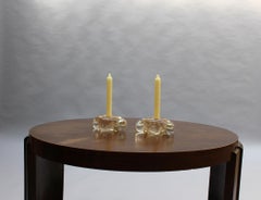 Deux bougeoirs en verre soufflé par Andre Thuret (vendus par paire)