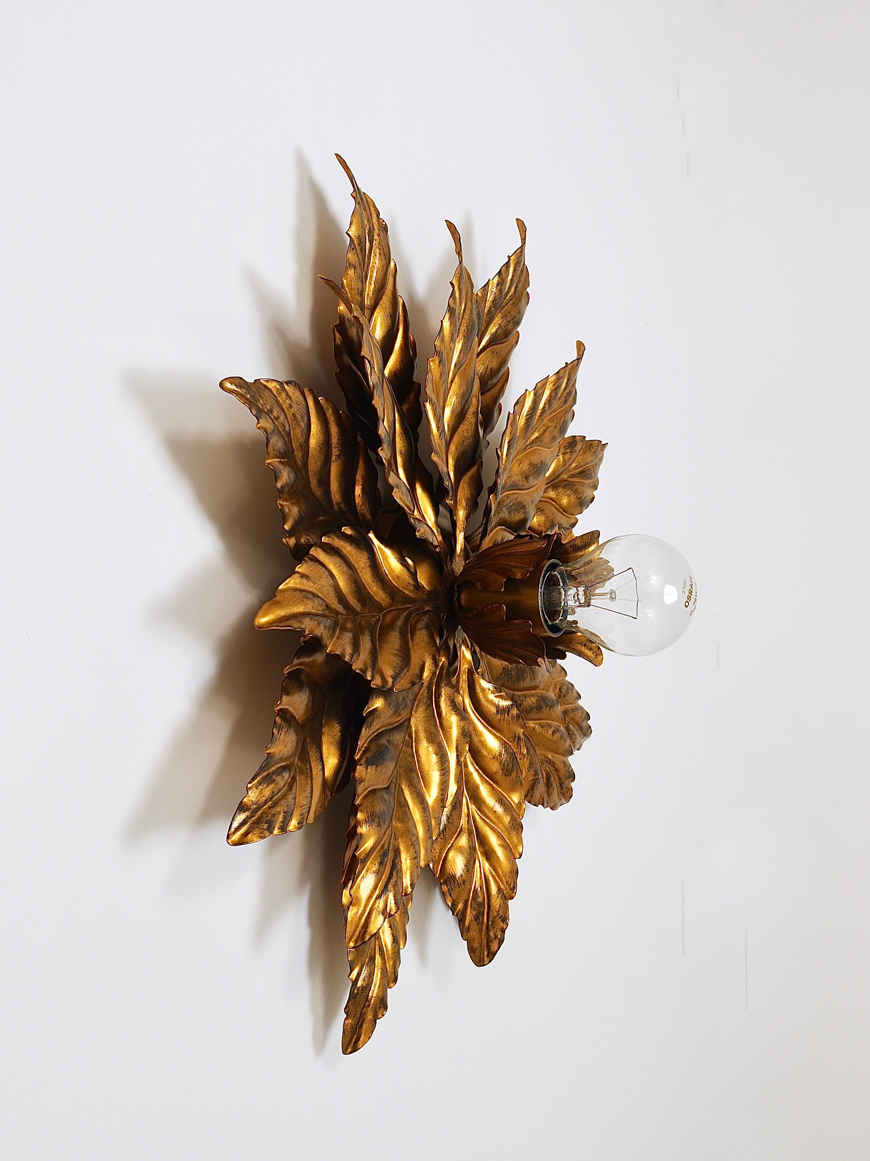 Up to two identical handcrafted decorative Florentine floral leaf lights designed by Hans Kögl / Koegl, who is also famous for his impressive palm tree floor lamps. Suitable to be used as wall lights / scones or as ceiling lights / flush mounts.