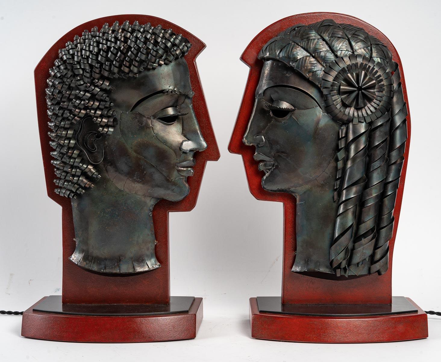 Two heads by Léon Masson