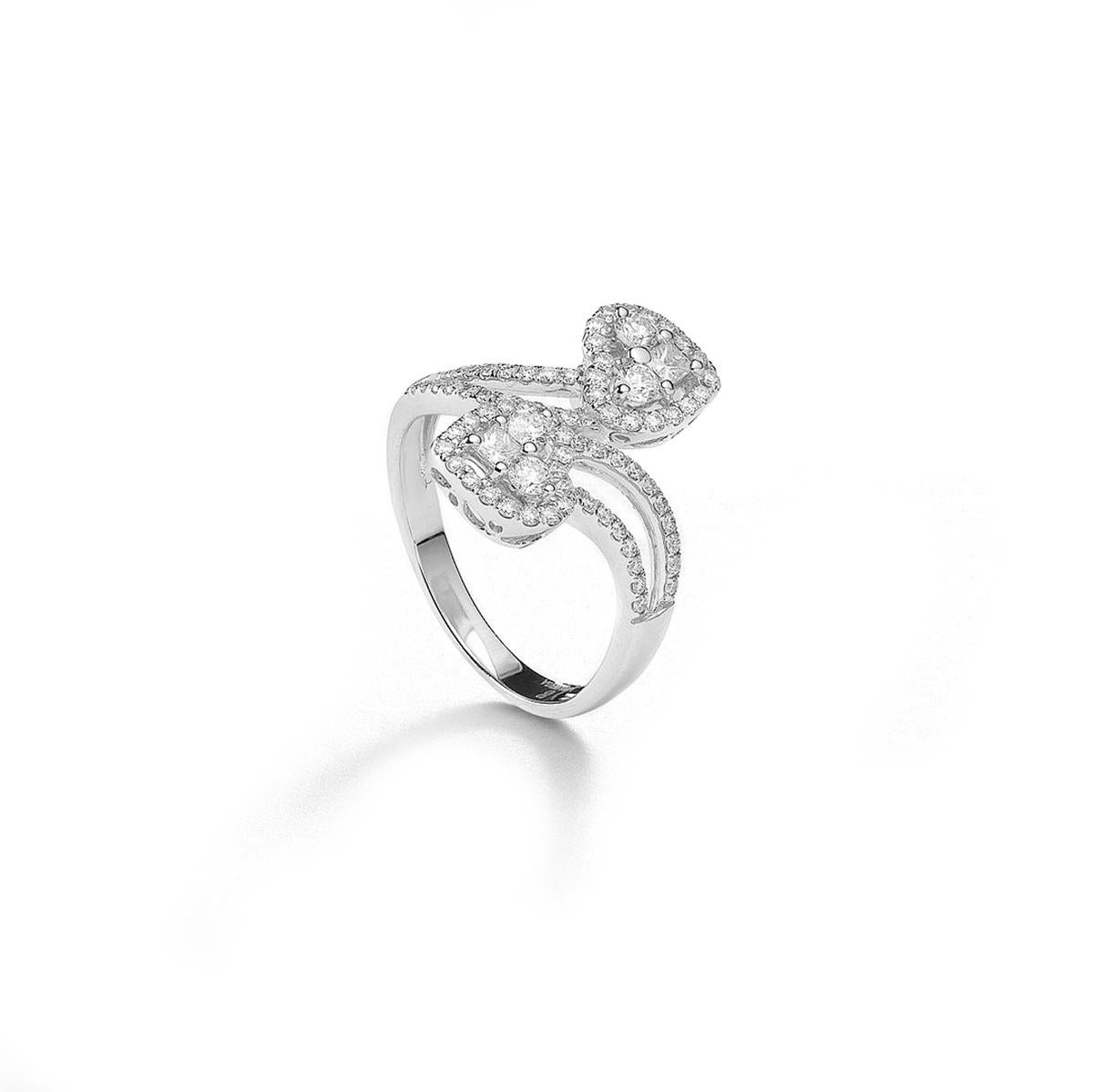 Ring two heart in 18kt white gold set with 2 princess cut diamonds 0.13 cts and 76 diamonds 0.61 cts Size 53           

Total weight: 3.86 grams