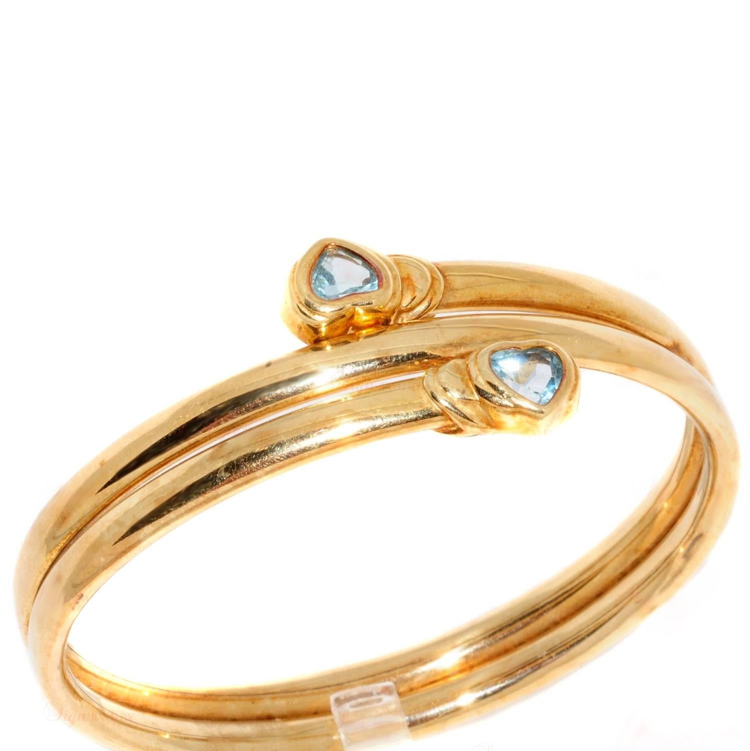 Two Hearts Blue Topaz Yellow Gold Bangle Bracelet In Excellent Condition In New York, NY