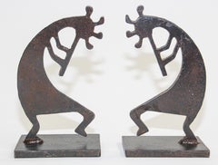 Schwere südwestliche Kokopelli-Metallskulpturen-Buchstützen