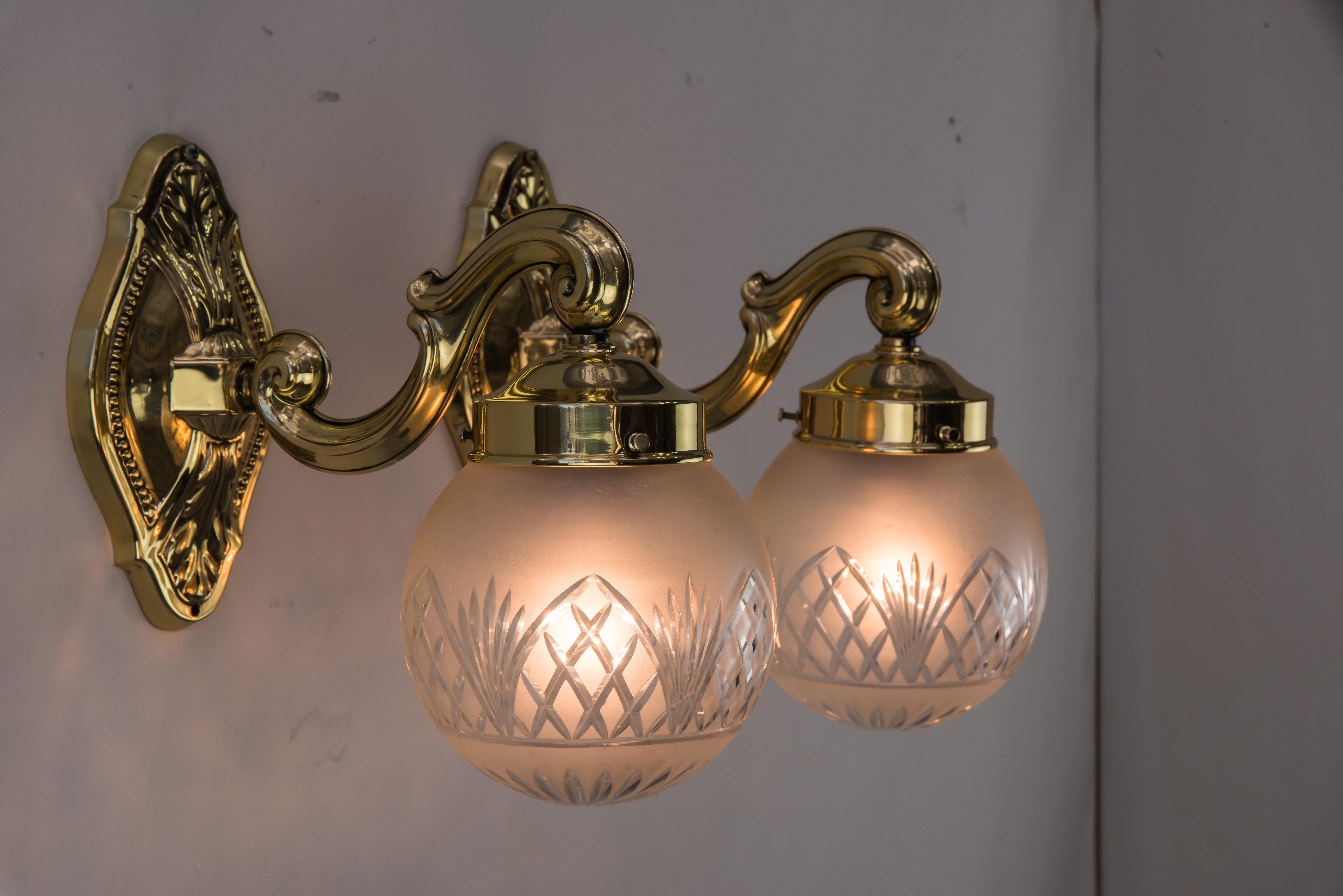 Neoclassical Two Historistic Wall sconces around 1890s with original cut glass shades