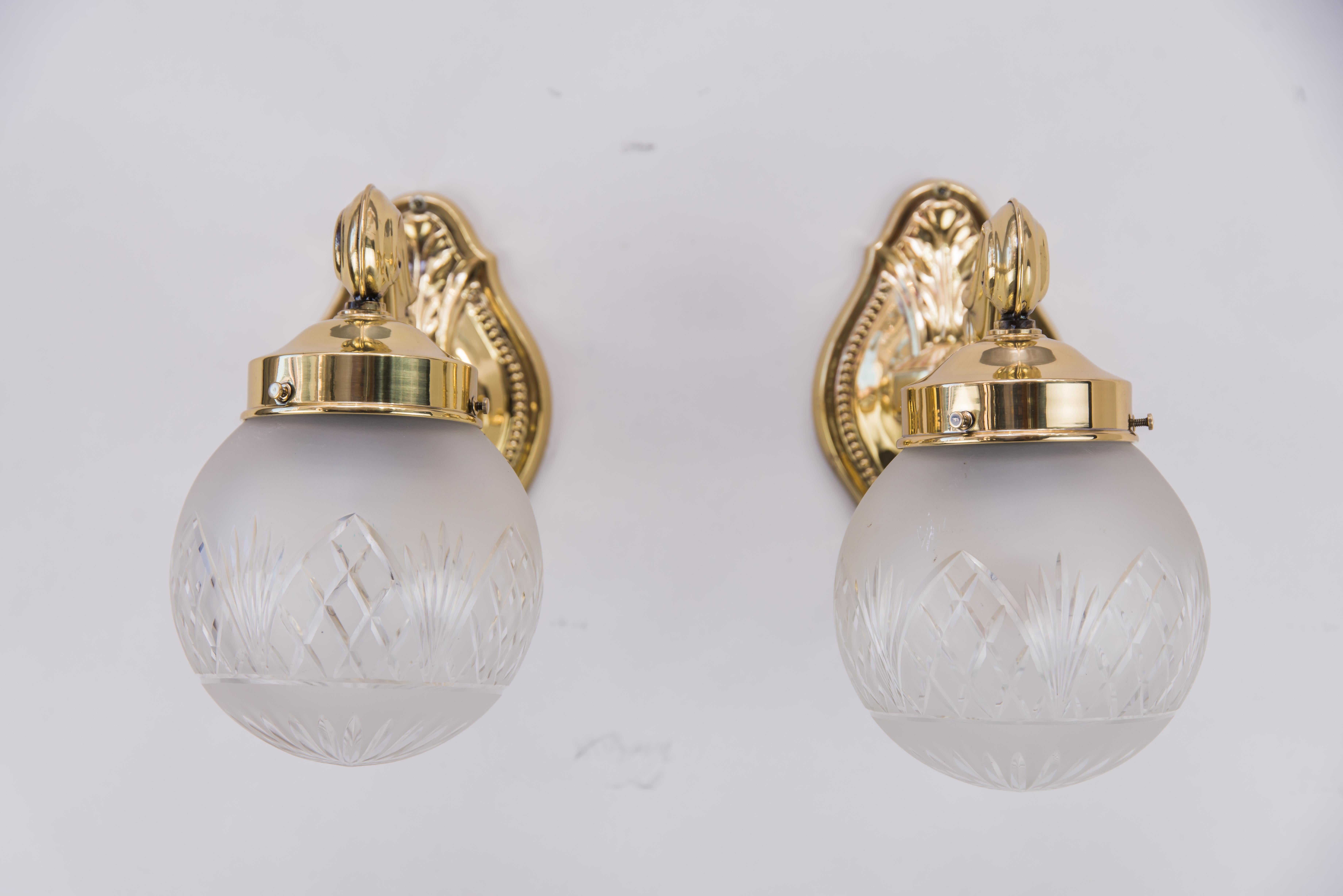 Austrian Two Historistic Wall sconces around 1890s with original cut glass shades