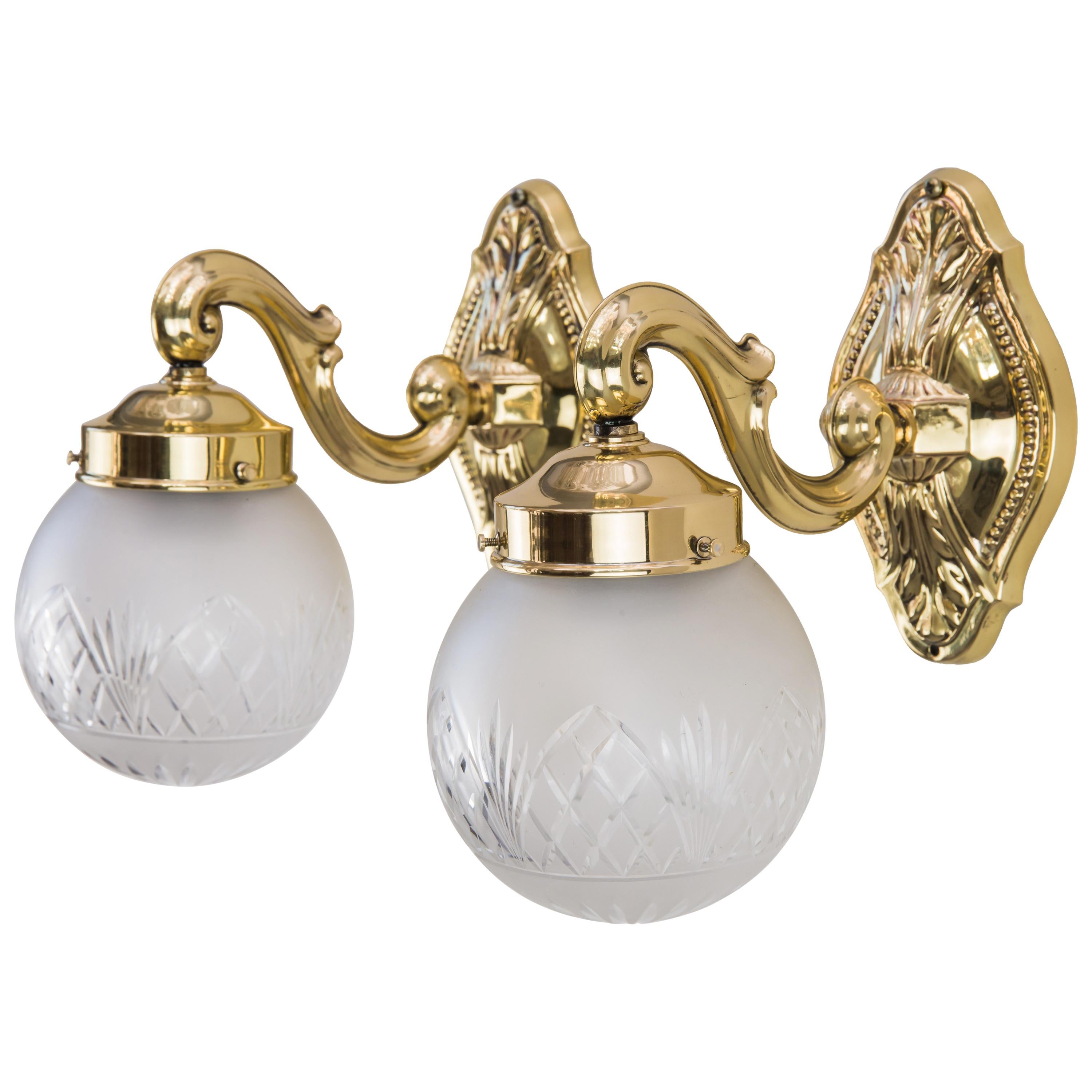Two Historistic Wall sconces around 1890s with original cut glass shades