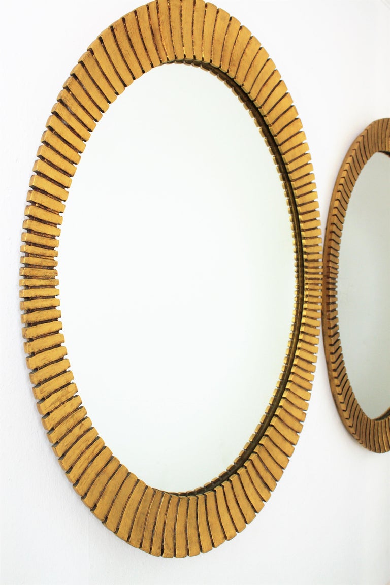 20th Century Hollywood Regency Francisco Hurtado Scalloped Giltwood Oval Mirror, 1950s For Sale